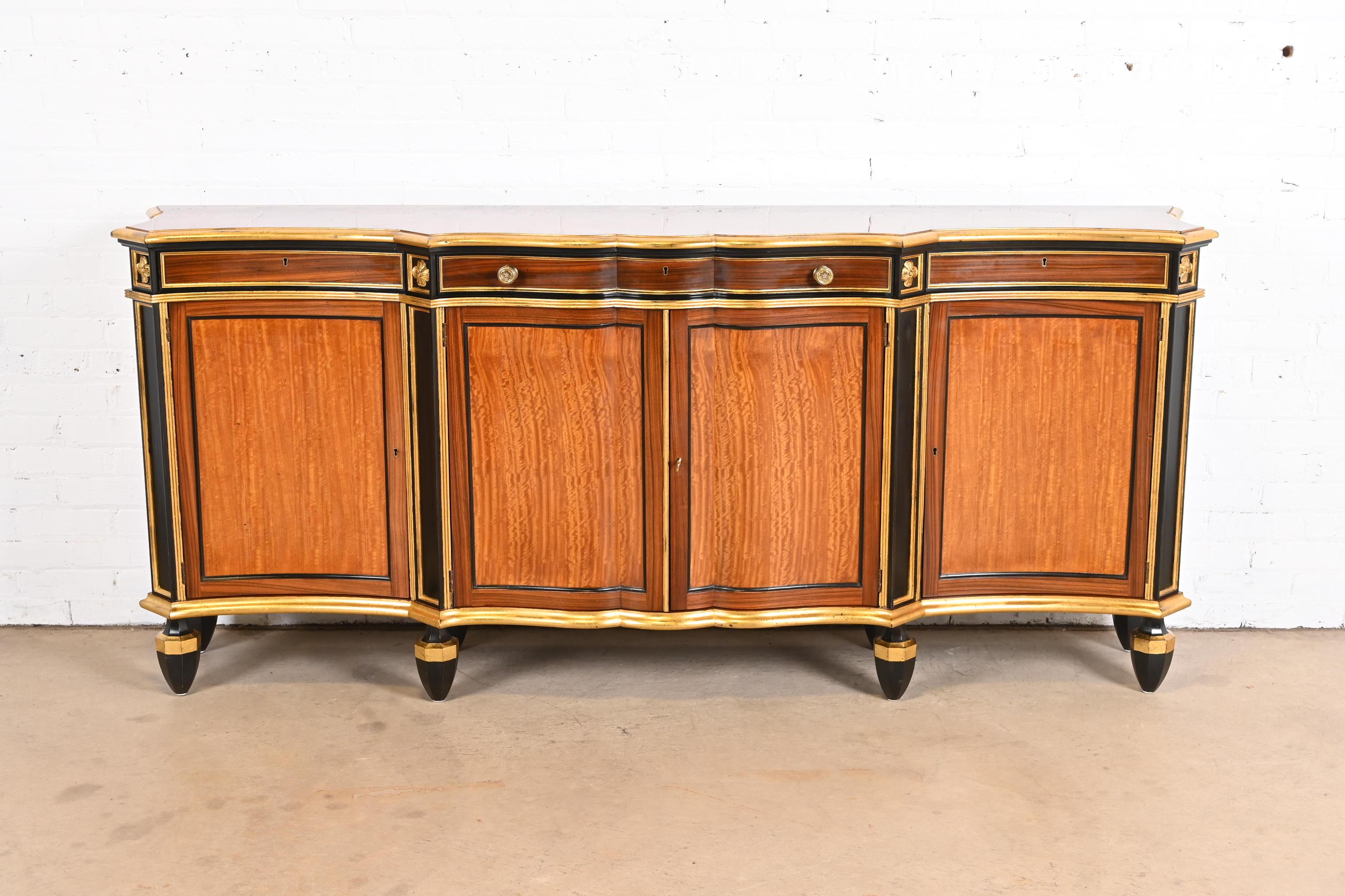 A rare and exceptional Regency or Neoclassical style serpentine satinwood sideboard, credenza, or bar cabinet

From the exclusive 