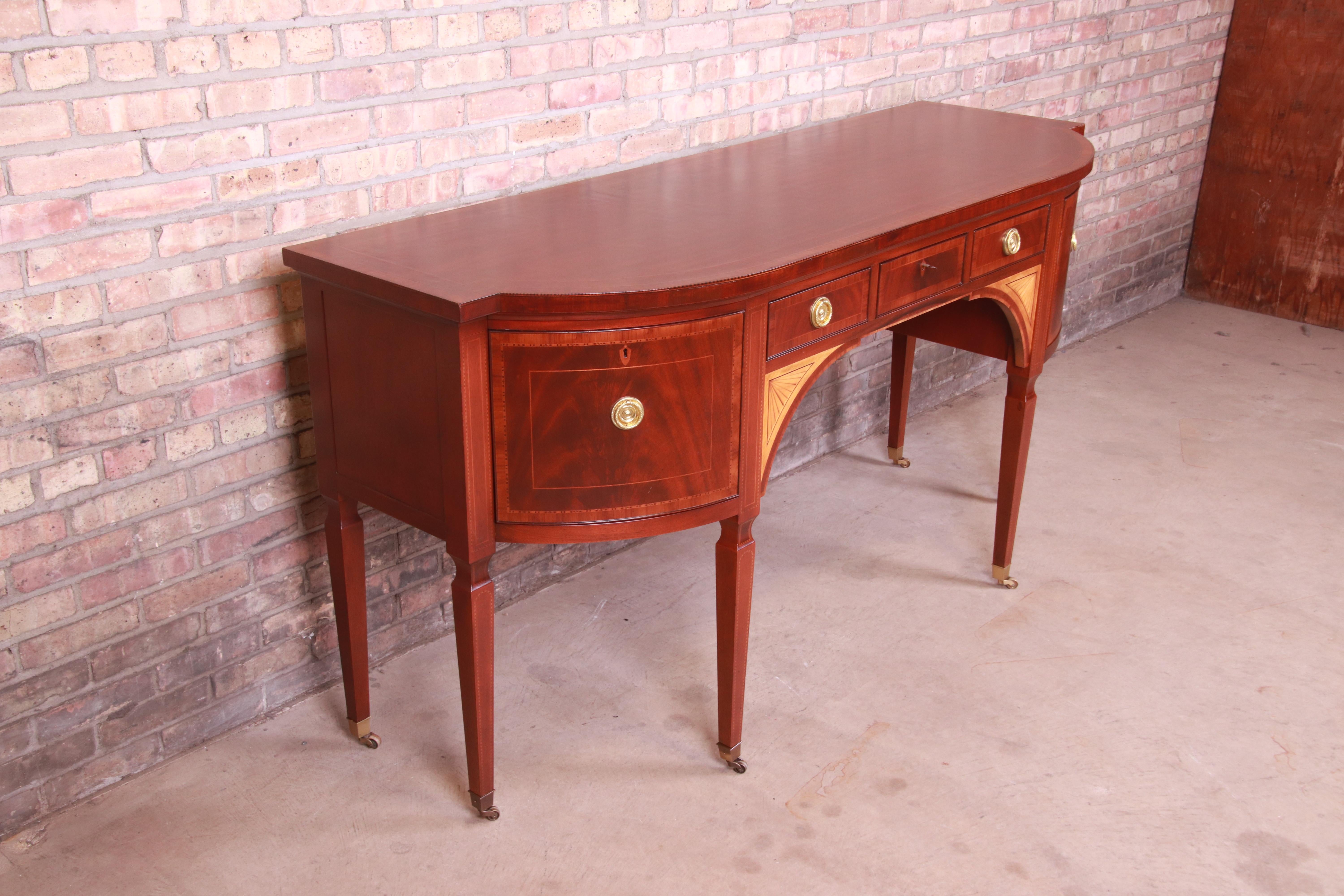 20th Century Baker Furniture Stately Homes Sheraton Bow Front Inlaid Mahogany Sideboard For Sale