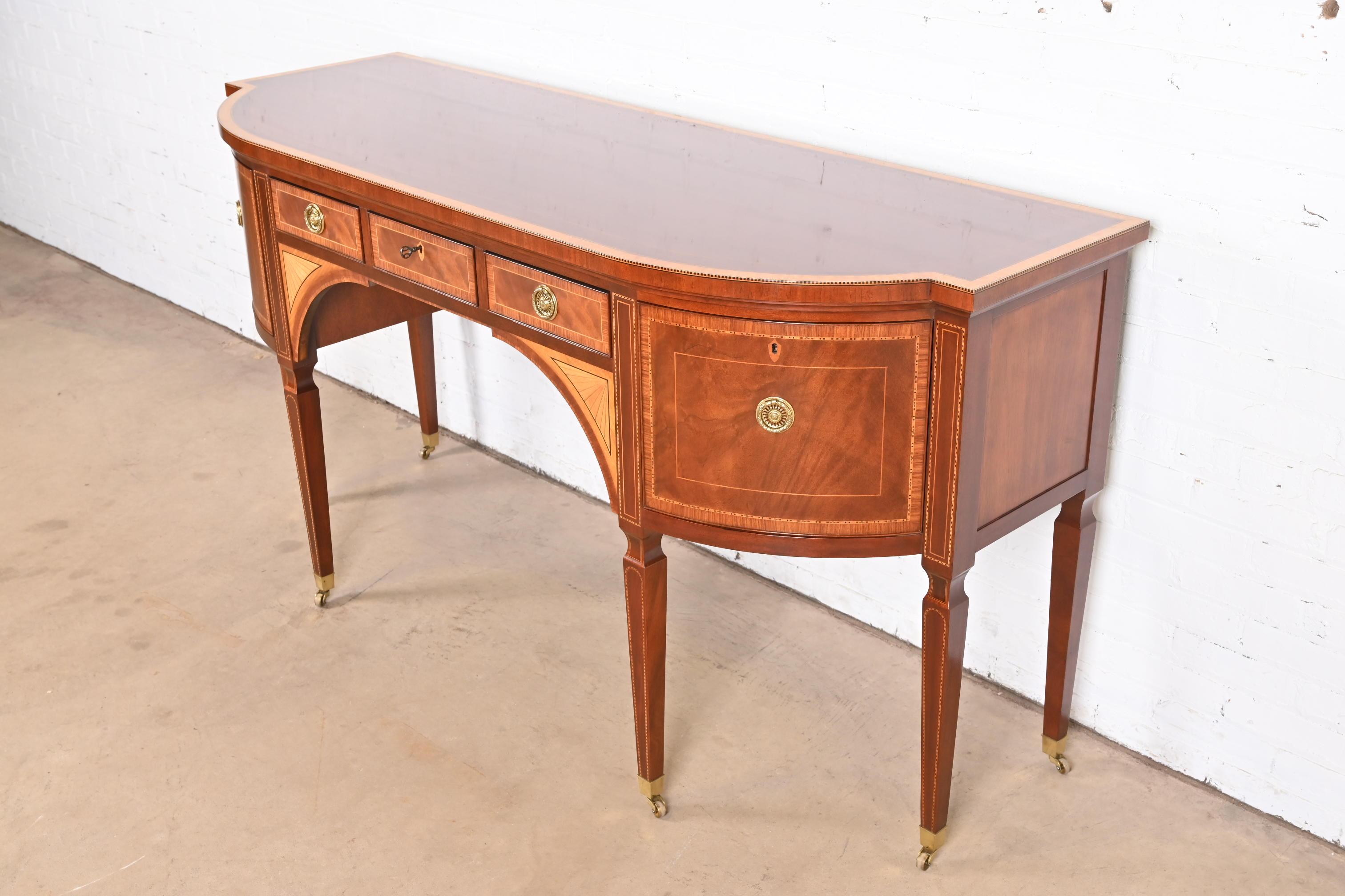 Late 20th Century Baker Furniture Stately Homes Sheraton Bow Front Inlaid Mahogany Sideboard For Sale
