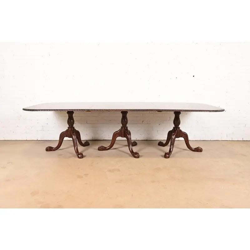 Georgian Baker Furniture Style Chippendale Triple Pedestal Dining Table, Newly Refinished For Sale
