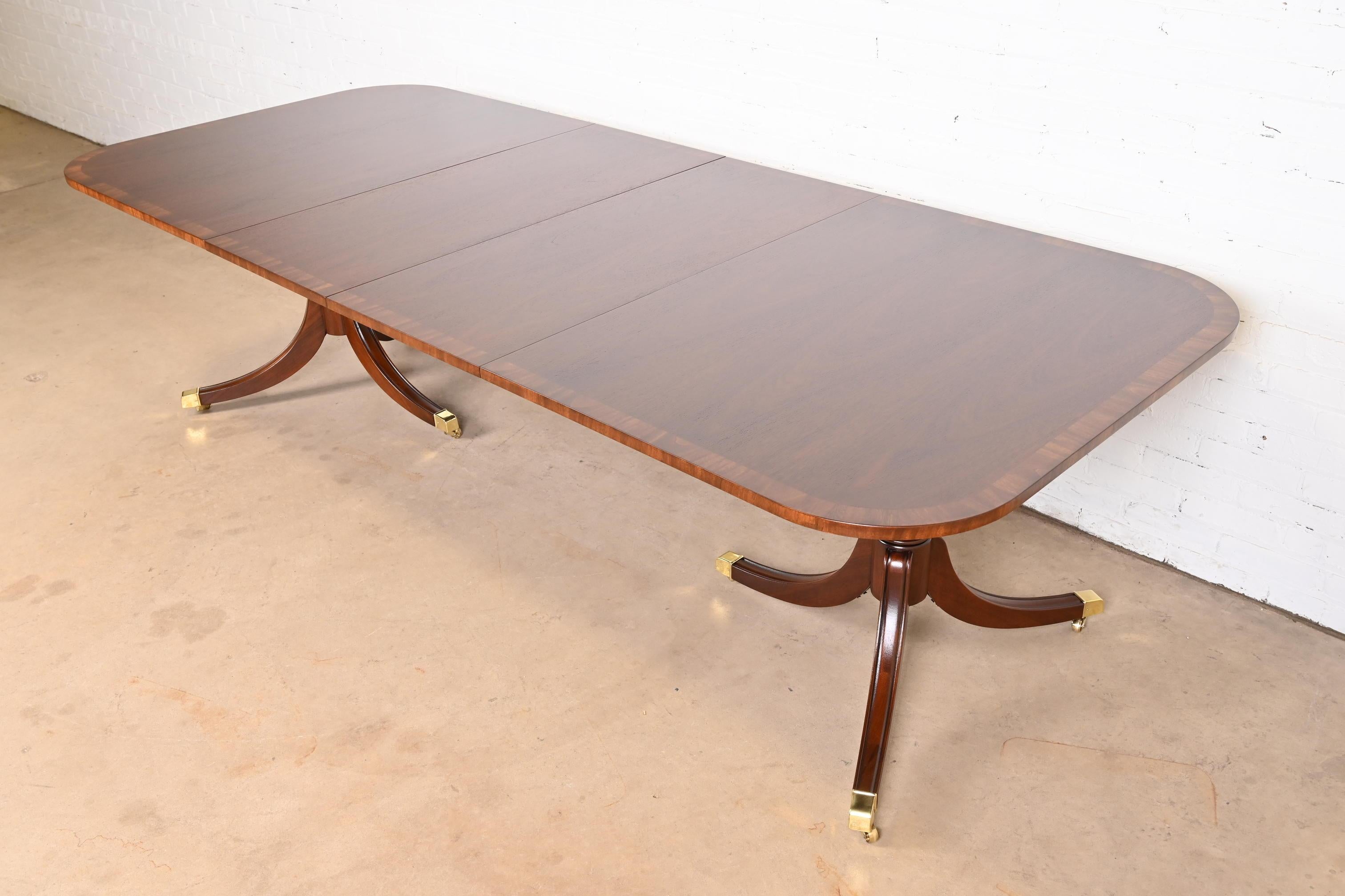 Baker Furniture Style Georgian Banded Mahogany Double Pedestal Dining Table In Good Condition In South Bend, IN