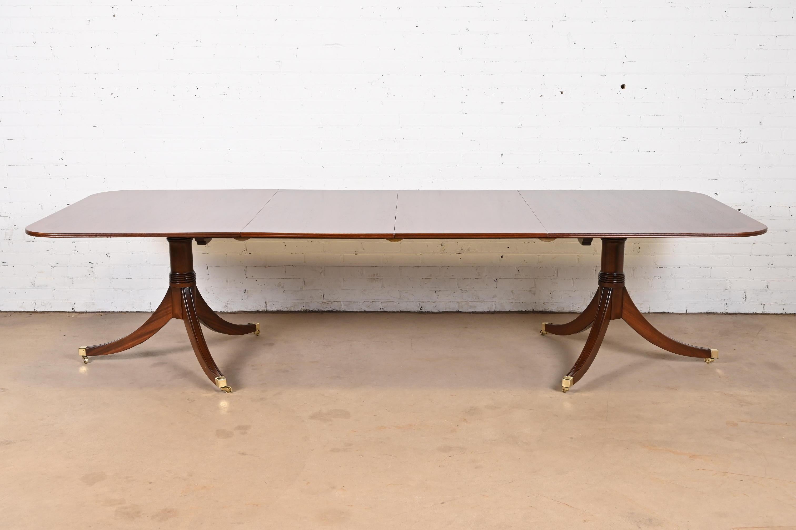 Baker Furniture Style Georgian Banded Mahogany Double Pedestal Dining Table In Good Condition In South Bend, IN