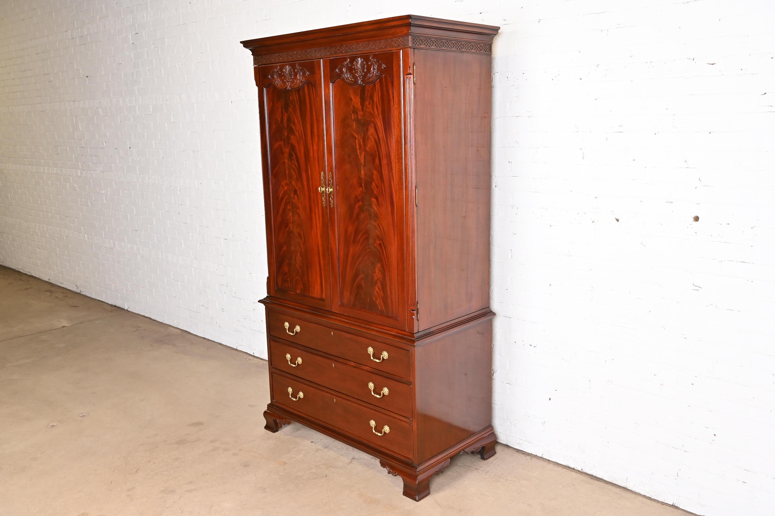 Baker Furniture Style Georgian Carved Flame Mahogany Armoire Dresser In Good Condition For Sale In South Bend, IN