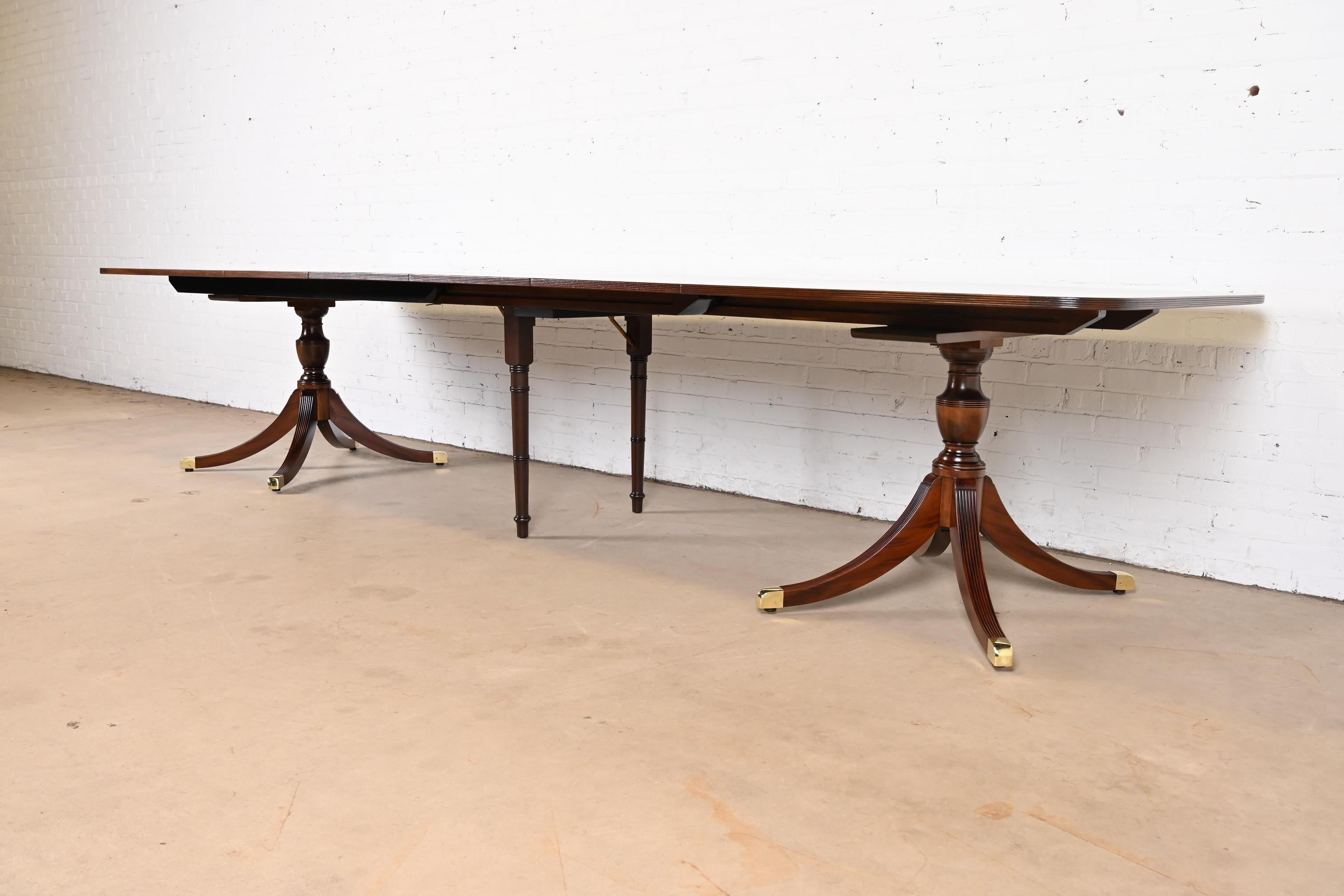 Carved Baker Furniture Style Georgian Mahogany Double Pedestal Dining Table, Refinished For Sale