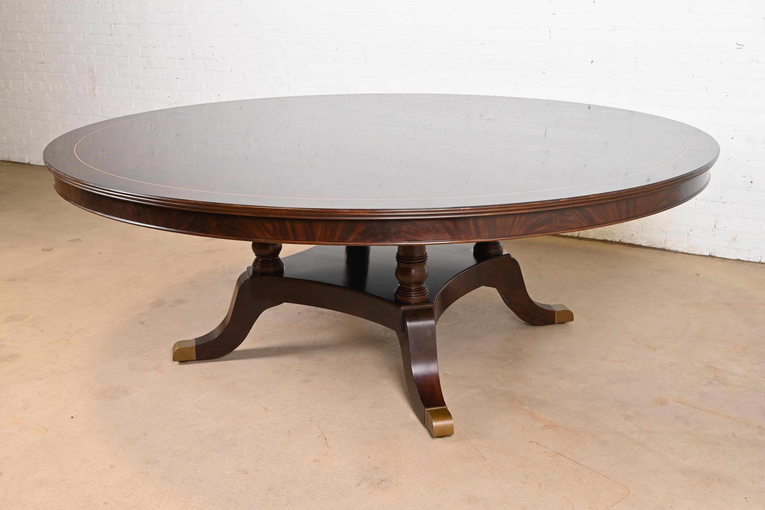 Baker Furniture Style Georgian Starburst Flame Mahogany Pedestal Round Table In Good Condition In South Bend, IN