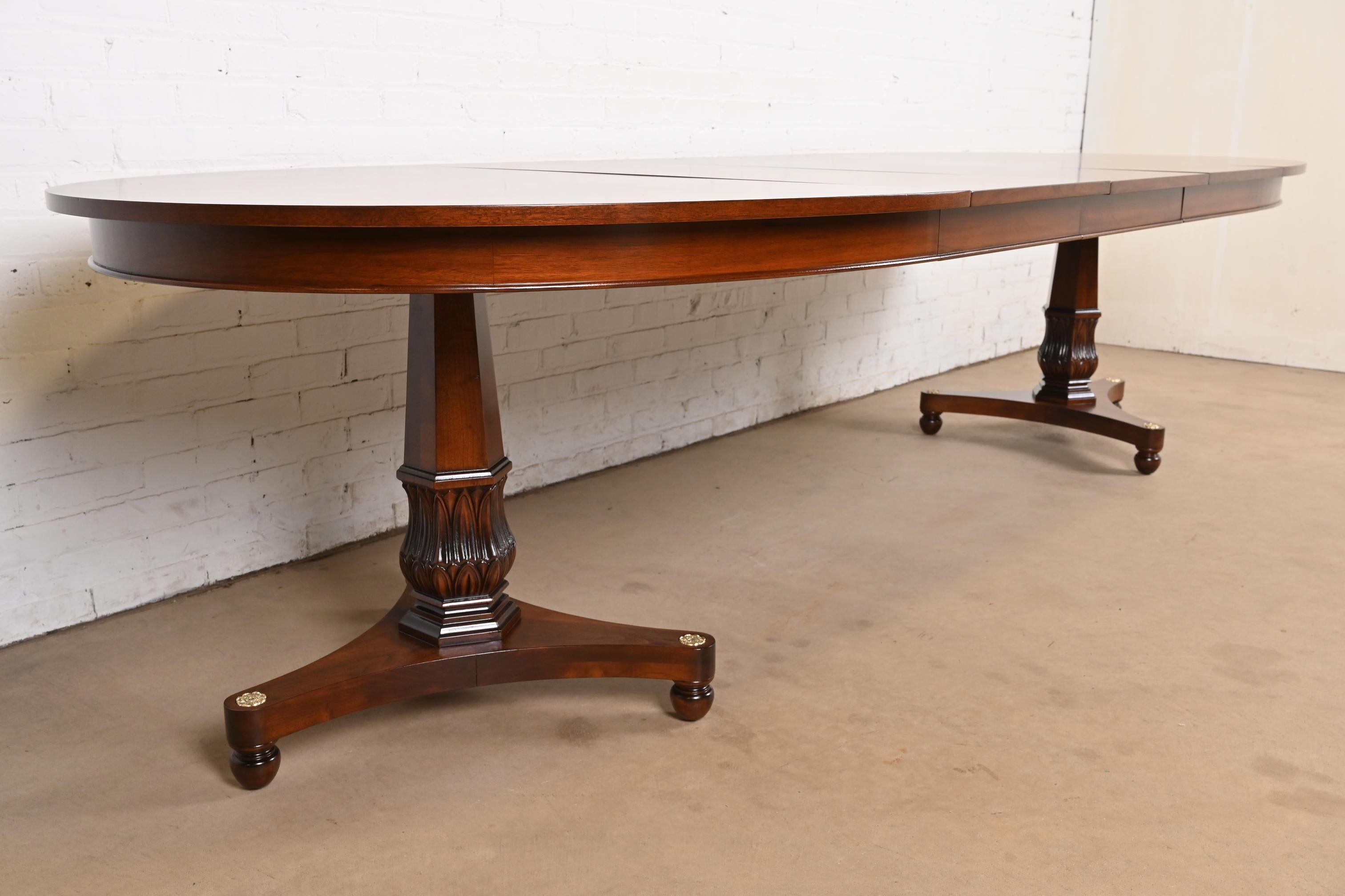 Mid-20th Century Baker Furniture Style Regency Walnut Double Pedestal Dining Table, Refinished For Sale