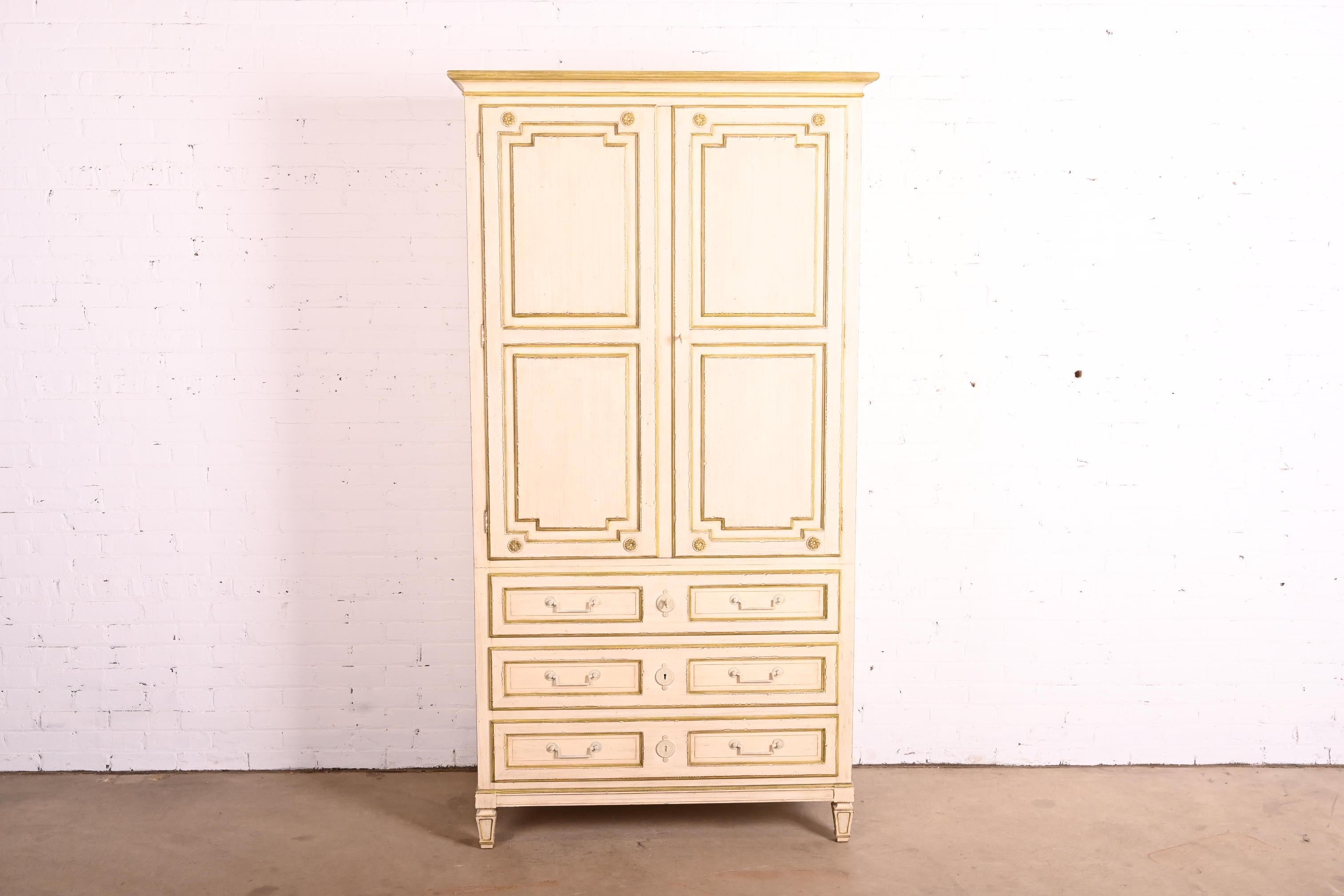 A gorgeous Swedish Gustavian or Louis XVI style armoire dresser or gentleman's chest

By Baker Furniture

USA, 1960s

Carved cream painted walnut, with olive green trim and accents. Cabinet locks, and original key is included.

Measures: 43.13