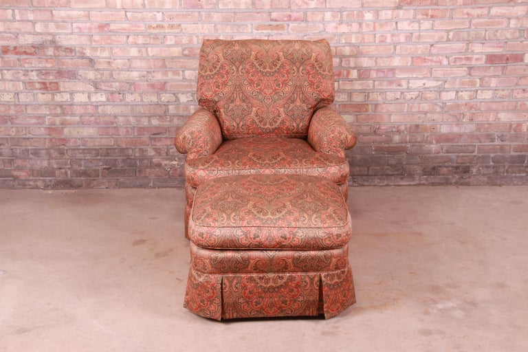 A gorgeous upholstered club chair or lounge chair with ottoman

By Baker Furniture

USA, Circa 1980s

Measures:
Chair - 38