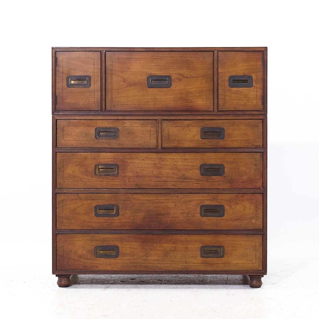 Baker Furniture Walnut Campaign Highboy Dresser

This highboy measures: 38 wide x 19 deep x 42.75 inches high

We take our photos in a controlled lighting studio to show as much detail as possible. We do not Photoshop out blemishes.

CONDITION: This