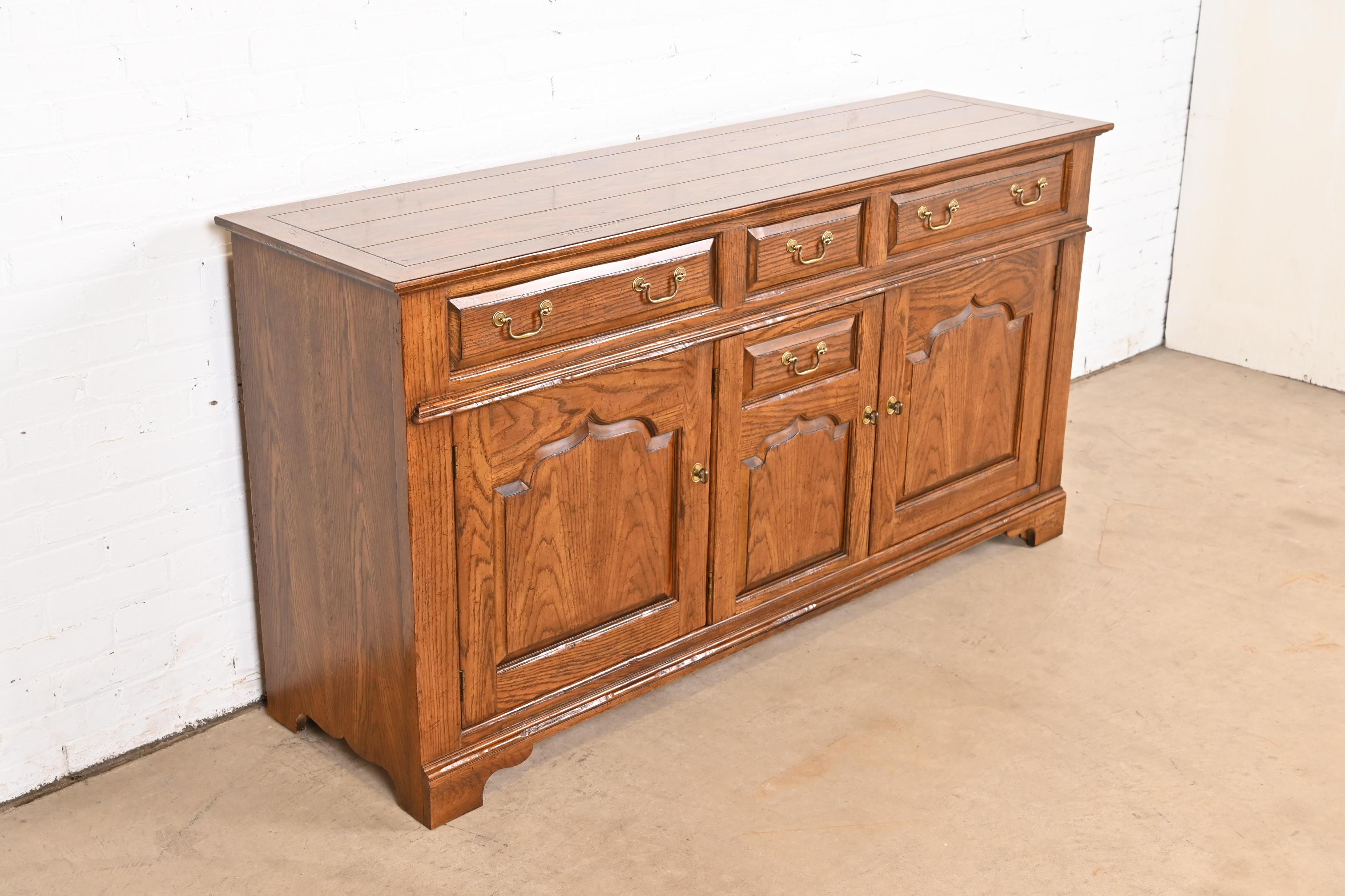 Late 20th Century Baker Furniture Welsh Oak Sideboard Buffet or Bar Cabinet For Sale