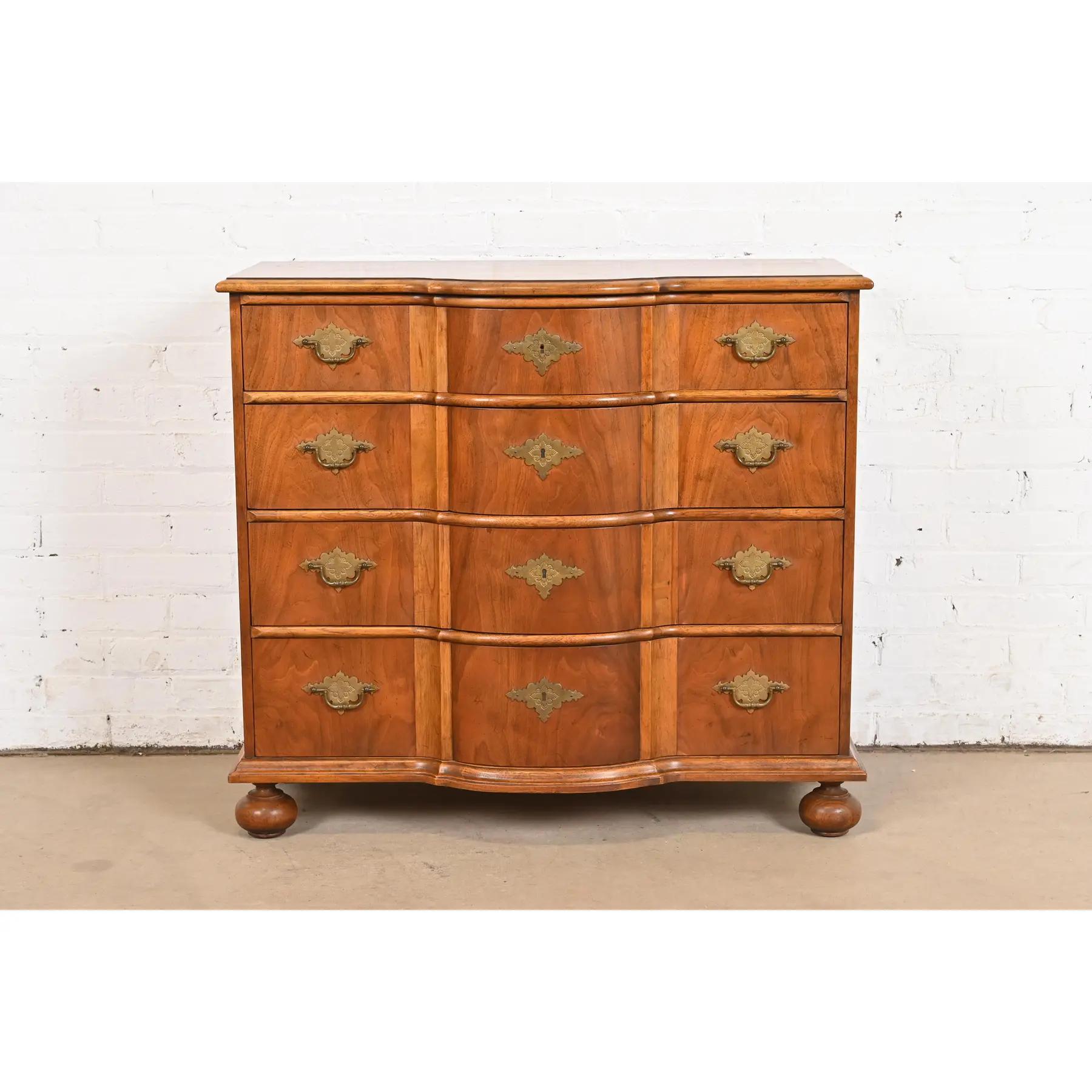 An exceptional William & Mary style four-drawer commode, dresser, or chest of drawers

By Baker Furniture, 