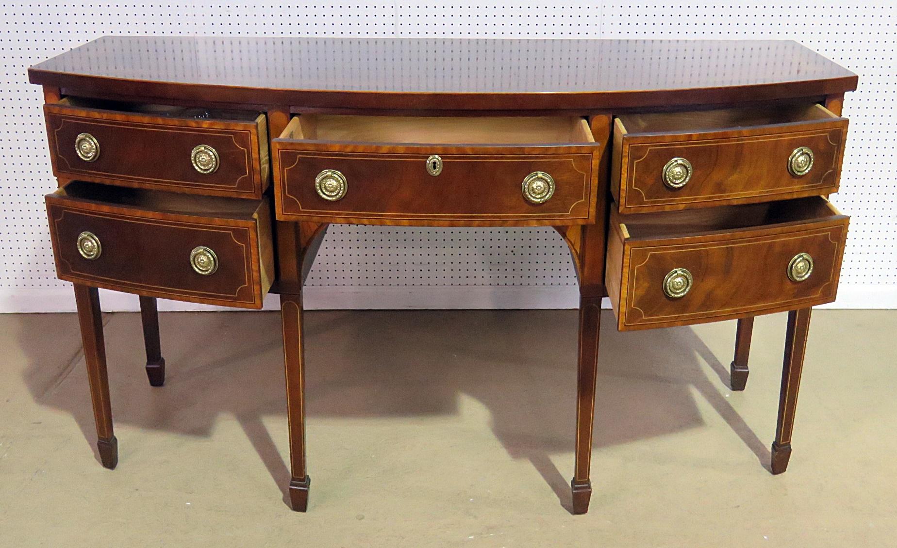 Baker Georgian style inlaid sideboard with five drawers.