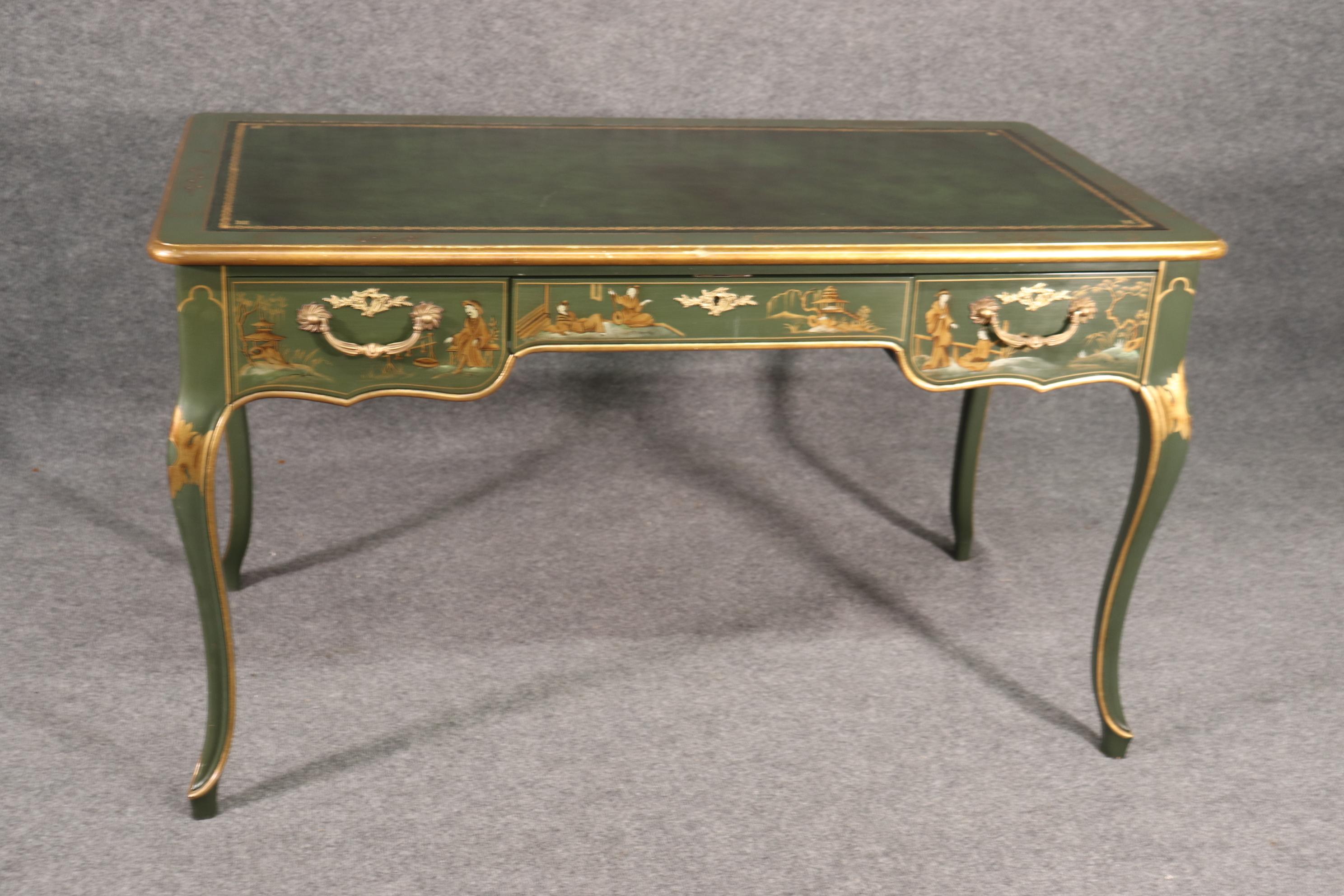 This is a rare color combination of gree on green. The top is a beautiful dark green and the rest of the desk is a soft sagey green. The desk is from the 1960s era and is in good condition with minor signs of age and use. This is a classic desk and