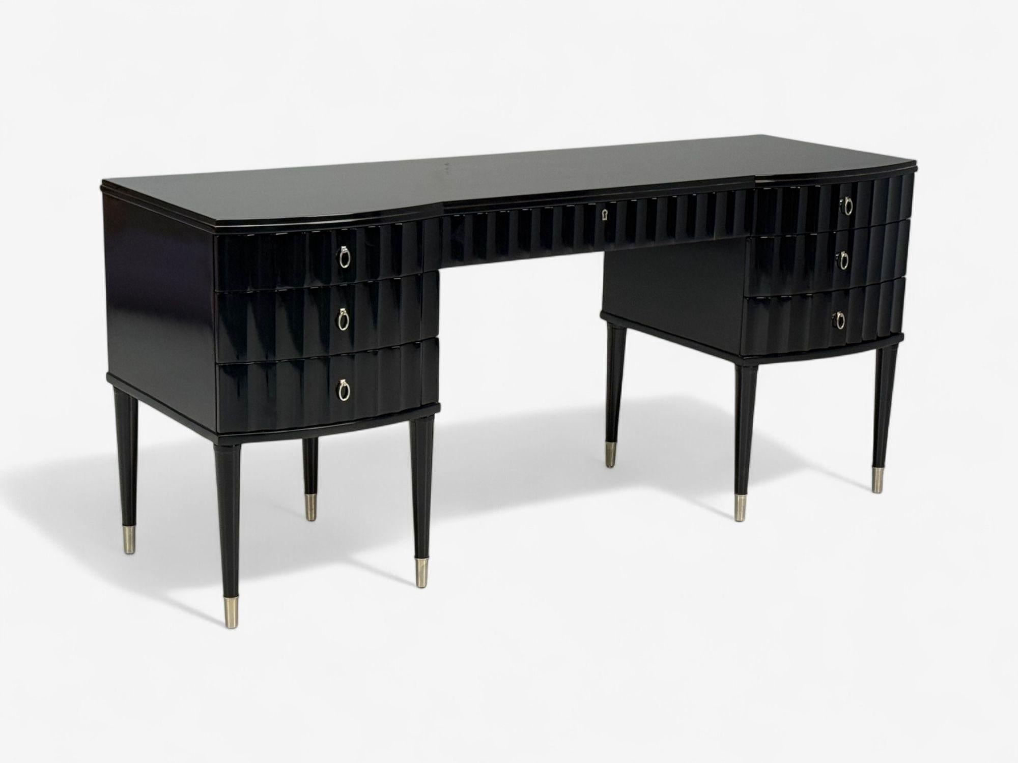 Barbara Barry, Baker, Hollywood Regency, Black Lacquer, Chrome, Writing Desk, USA, 21st C.

A fully refinished writing desk designed by Barbara Barry for Baker Furniture in the United States c. early 2010s. This example features a wonderful high