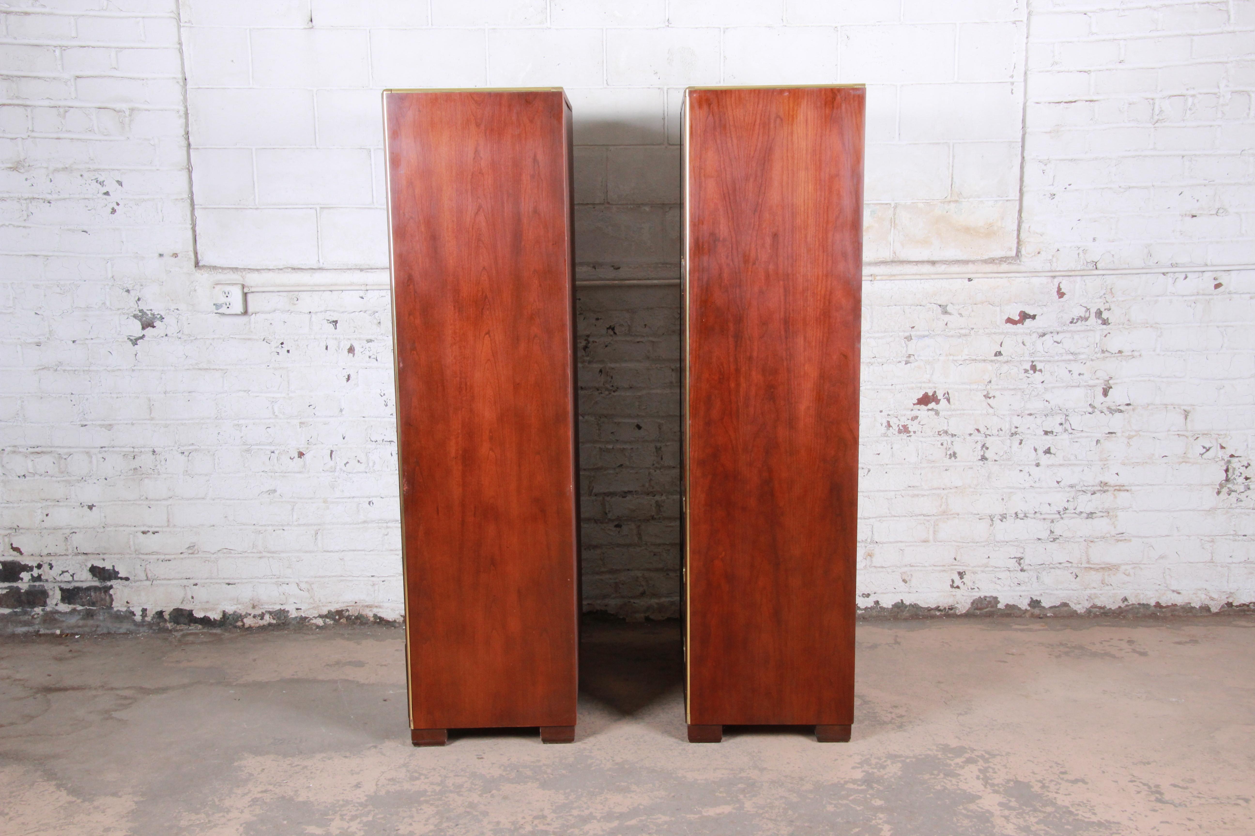 Baker Hollywood Regency Campaign Style Cherry and Brass Armoire Dressers, Pair In Good Condition In South Bend, IN