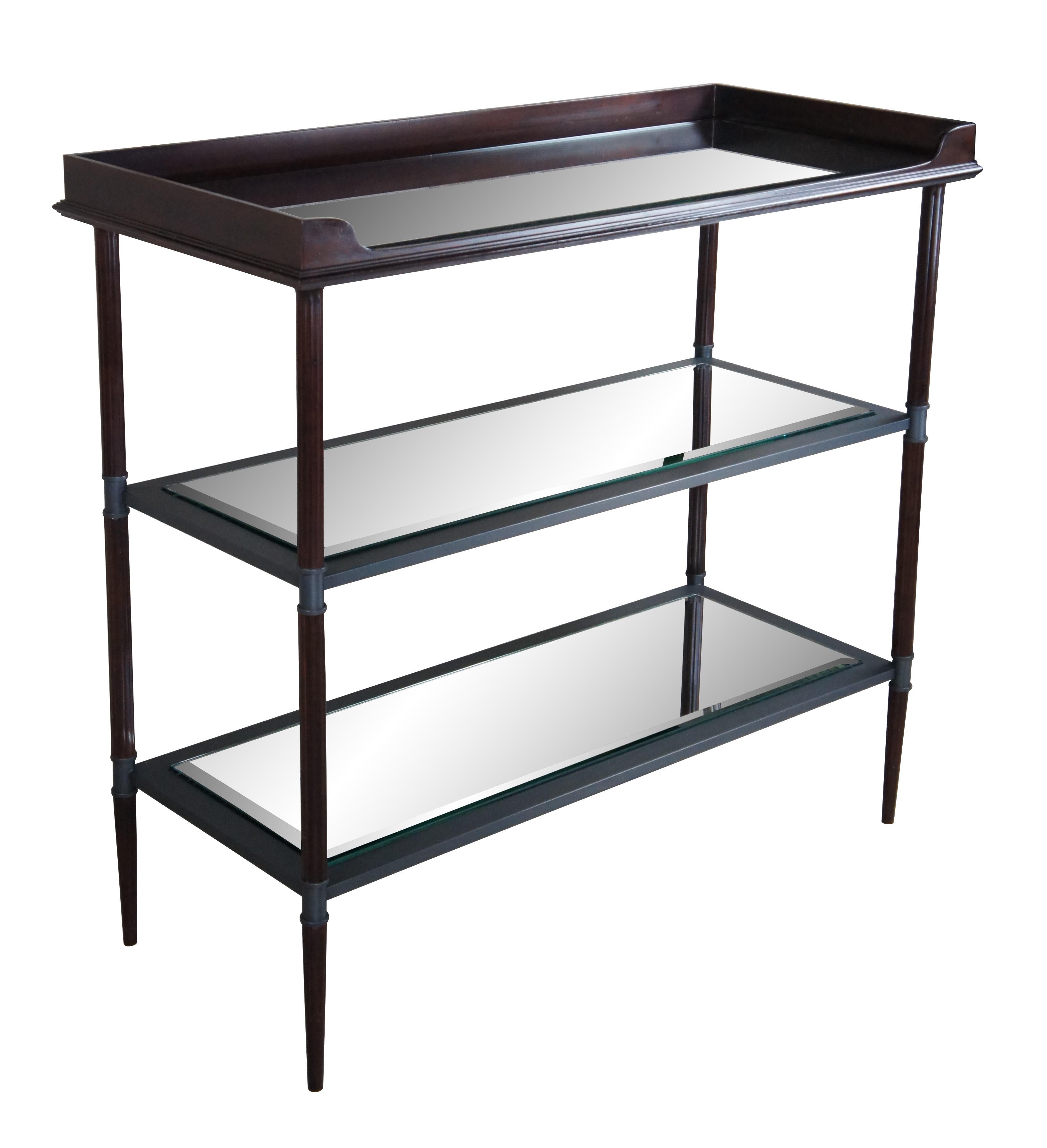 Vintage Baker Furniture Garcia Collection drybar / etagere / side entry table / console / or sideboard.  Made of mahogany with a three tiered design that features an upper mirrored shelf with gallery over two additional beveled glass