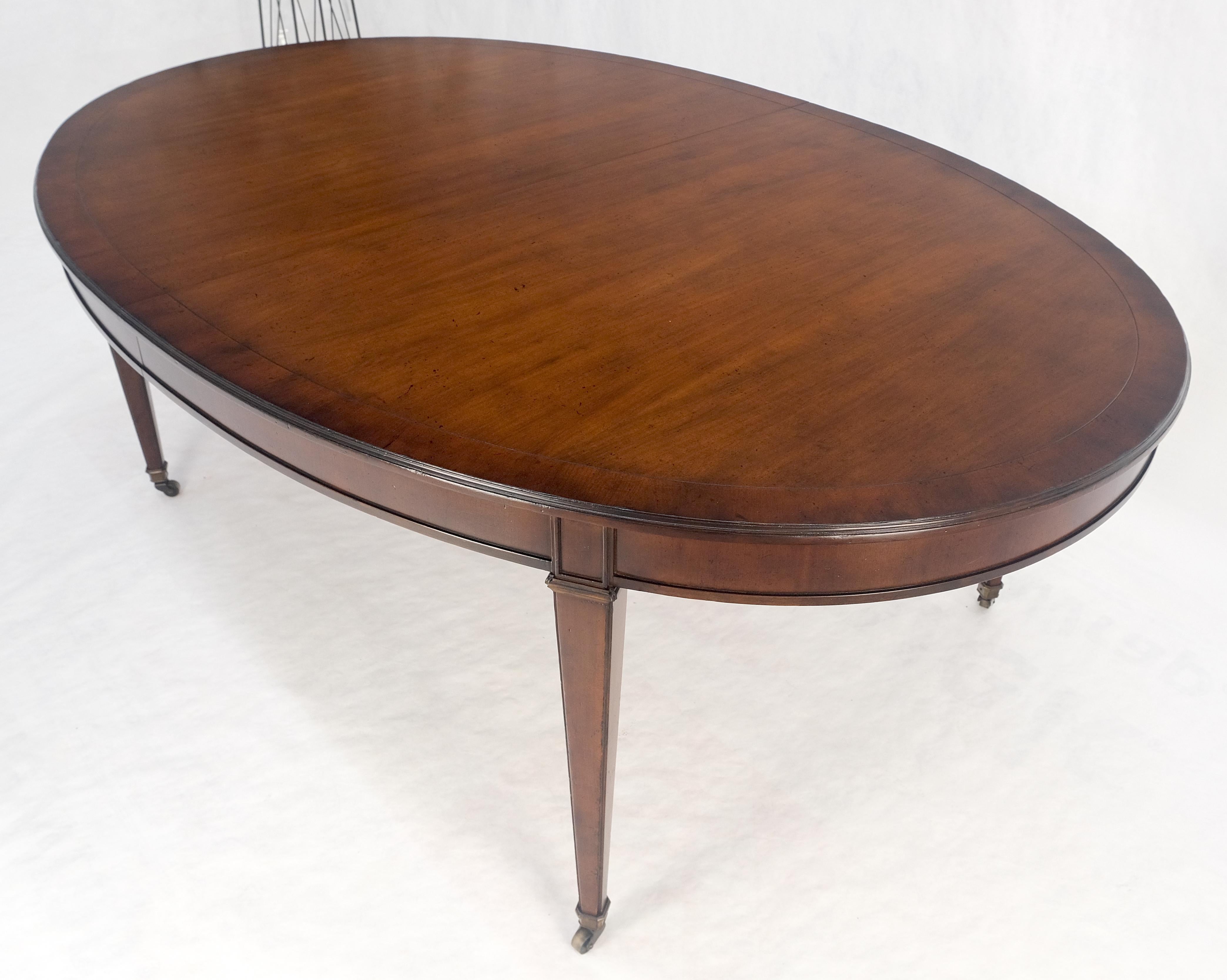 Baker Mesa de Comedor Ovalada Grande 2 Tableros Extensibles Nogal Oscuro Bandeado MENTA Latón en venta