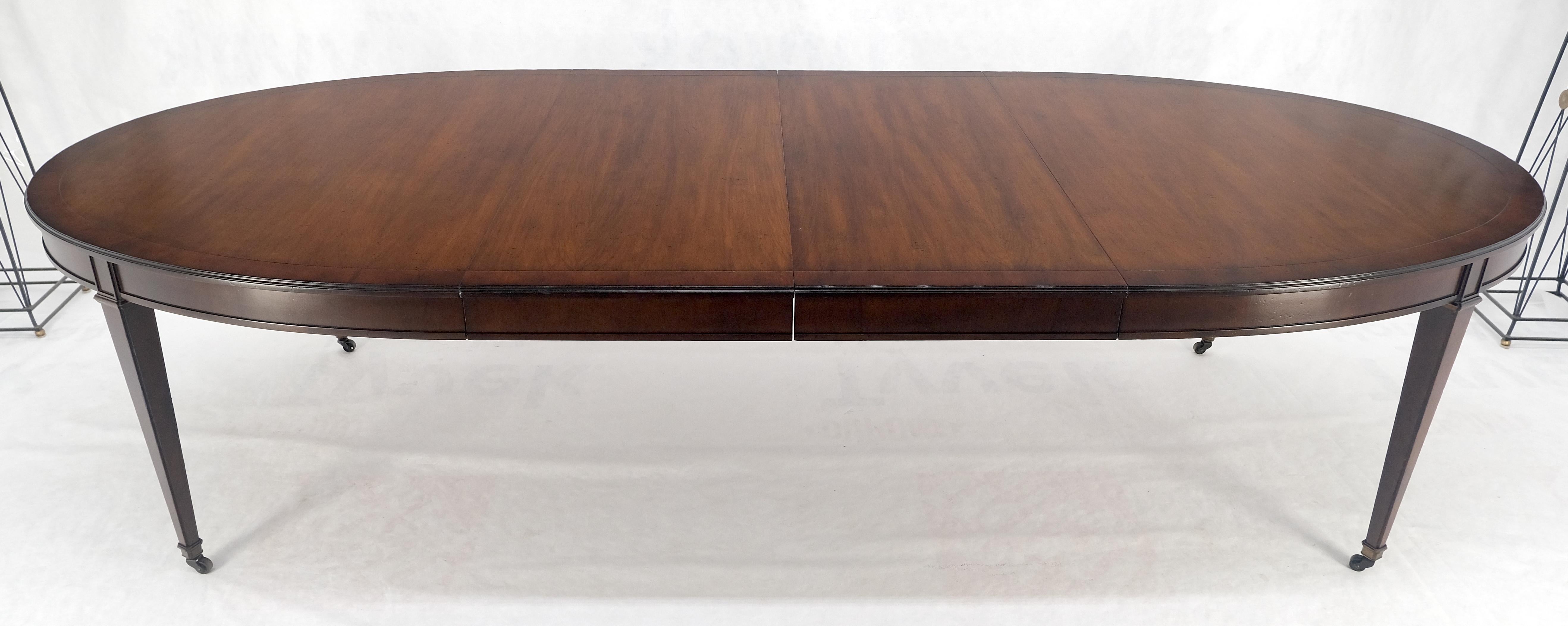 Baker Mesa de Comedor Ovalada Grande 2 Tableros Extensibles Nogal Oscuro Bandeado MENTA en venta 1
