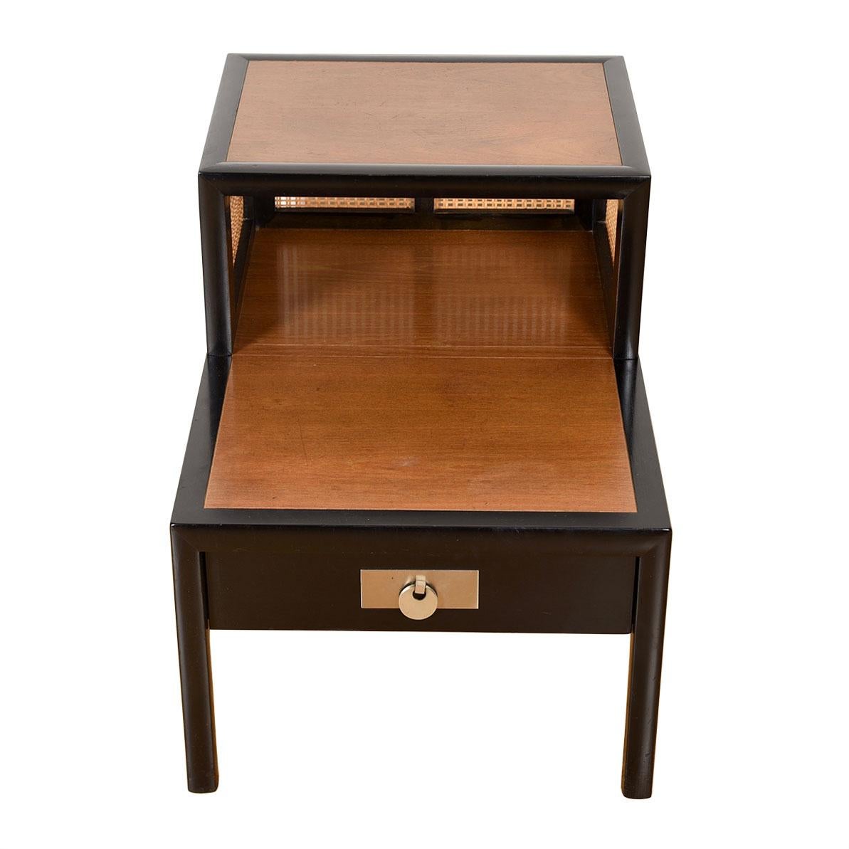Baker midcentury Decorator Black Lacquer + Cane Step Side Table

Additional information:
Material: Lacquer
Featured at Kensington:
Bi-level side table by baker from their asian line
Black lacquer frame accented by wood table surfaces and cane