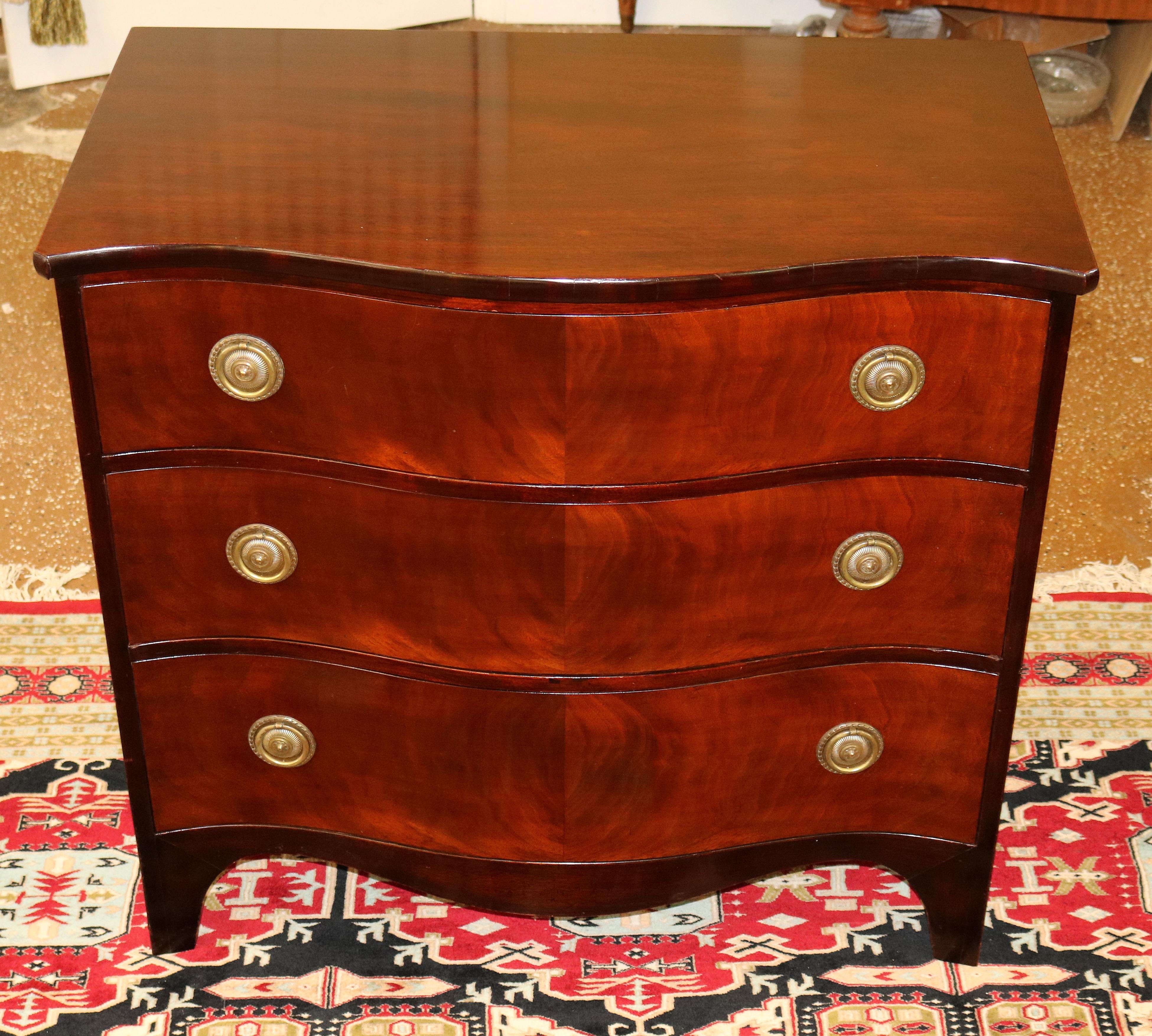 ​Baker Regency Style Mahogany Serpentine Chest Of Drawers 

Measures
34 1/4 in H x 36 1/2 W x 20 1/2 D
