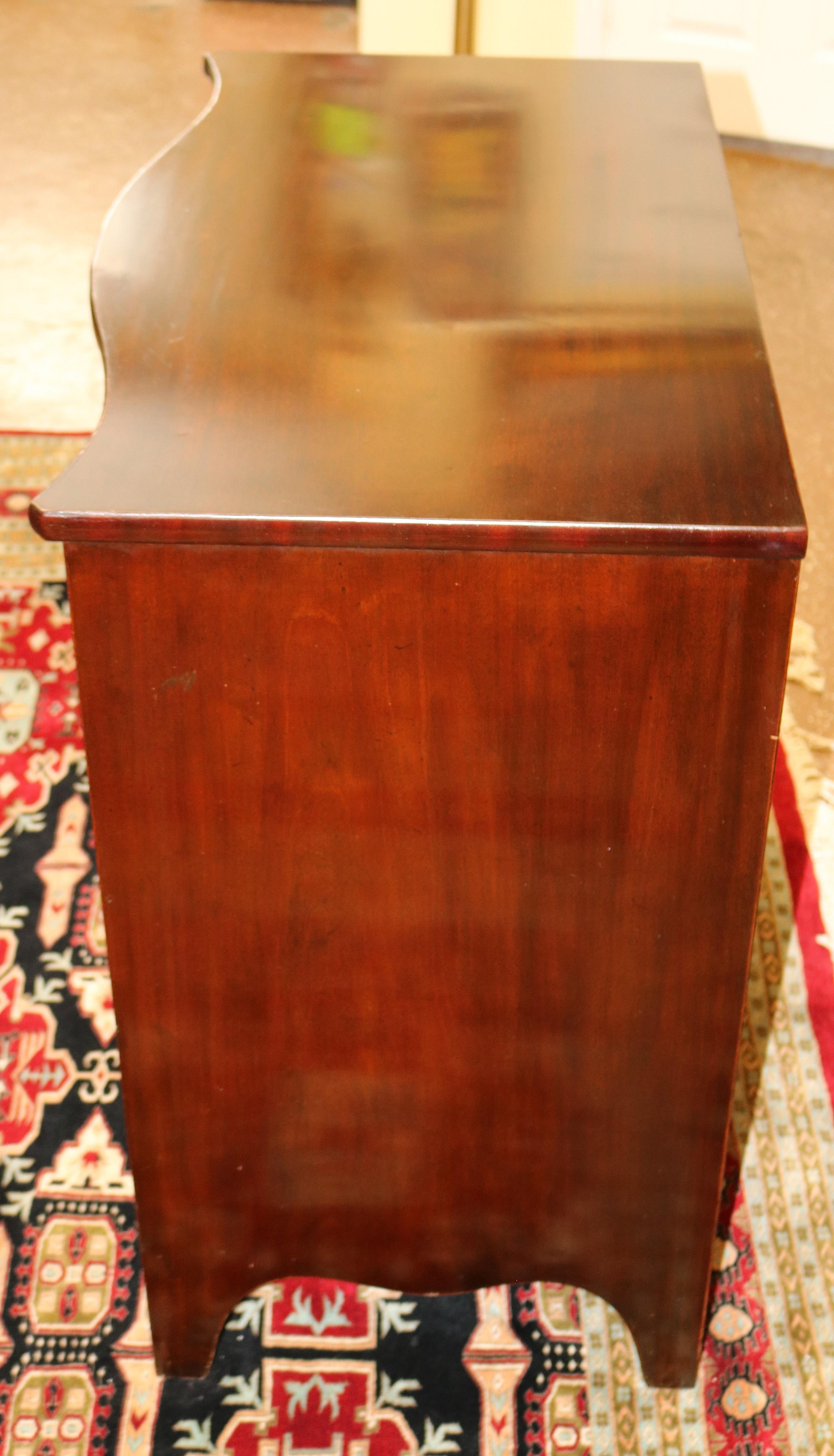 Late 20th Century Baker Regency Style Mahogany Serpentine Chest Of Drawers For Sale