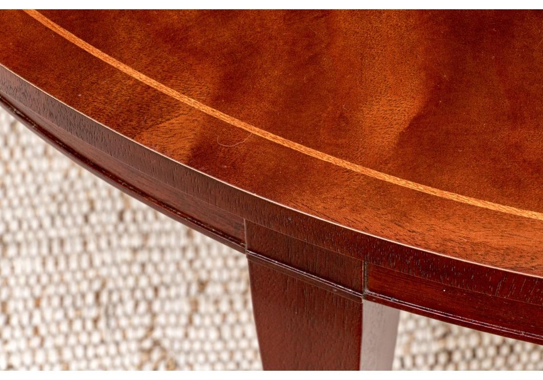 Brass Baker Sheraton Style Mahogany Oval Cocktail Table With Pull Out Trays For Sale