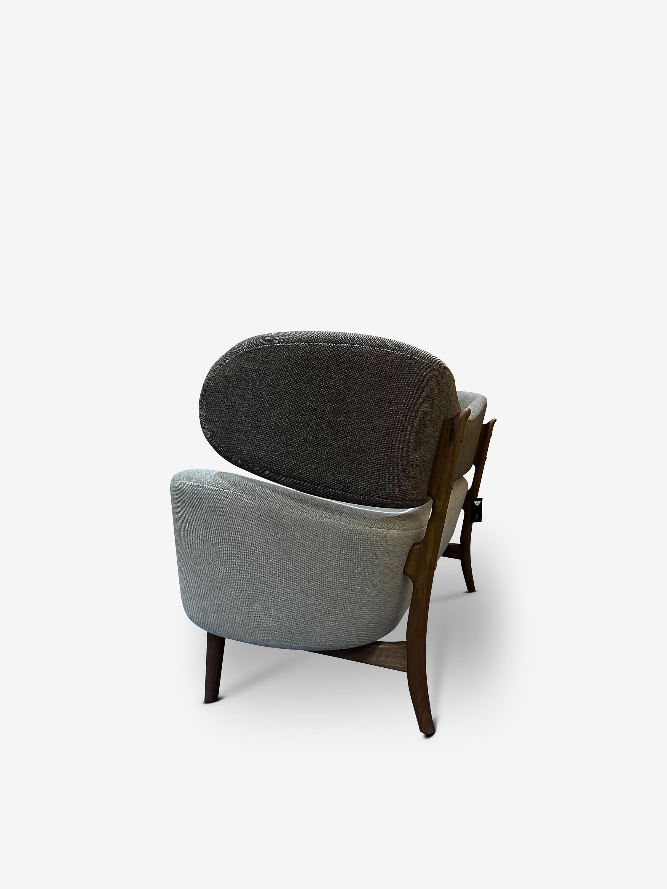 The Baker Sofa in Clay by House of Finn Juhl offers expert craftsmanship and timeless design. With clean lines and a neutral color, this sofa will elevate any living space. Made by the renowned House of Finn Juhl, it boasts quality and