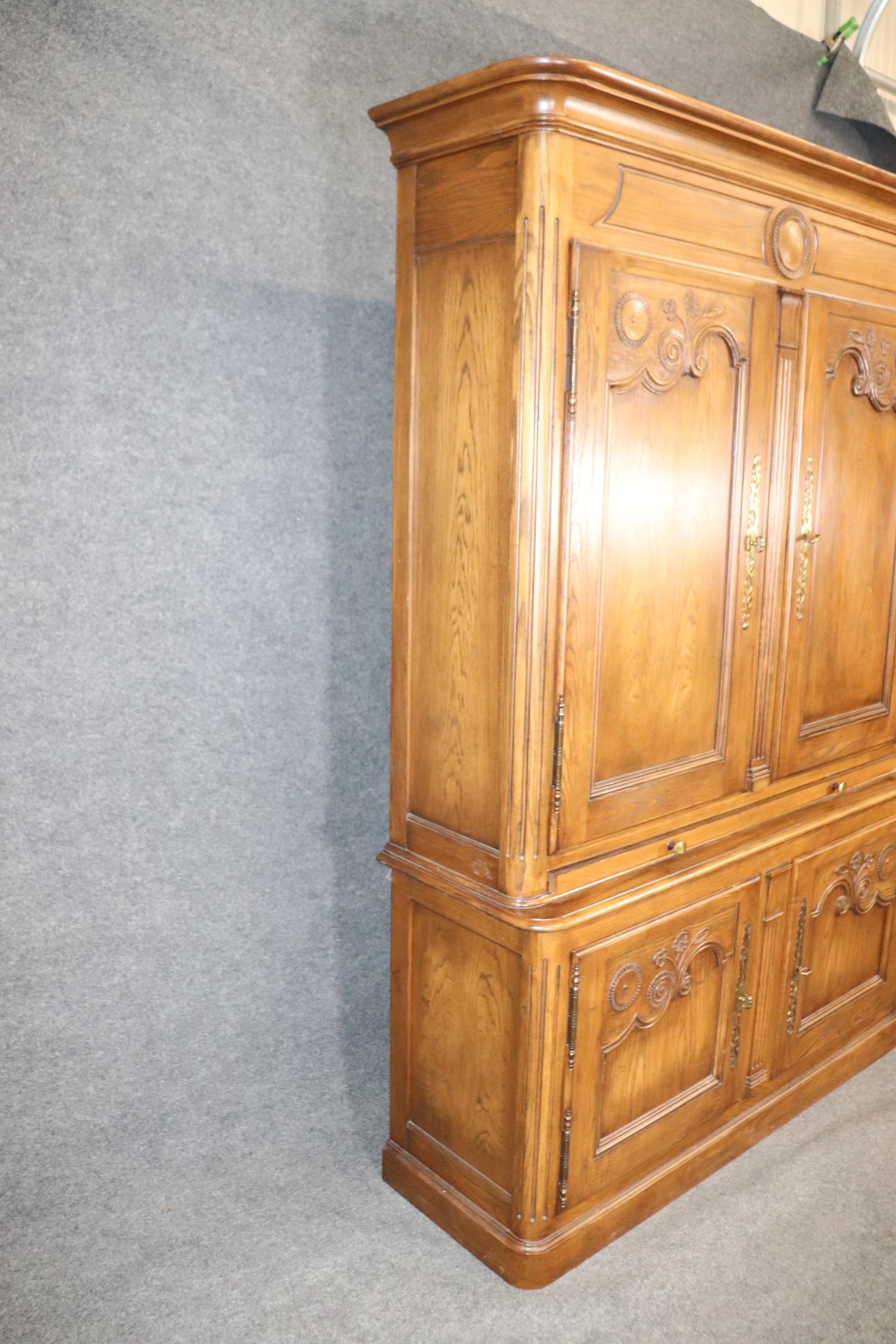 Baker Solid Oak Country French Breakfront China Cabinet with Desk Lighted In Good Condition For Sale In Swedesboro, NJ