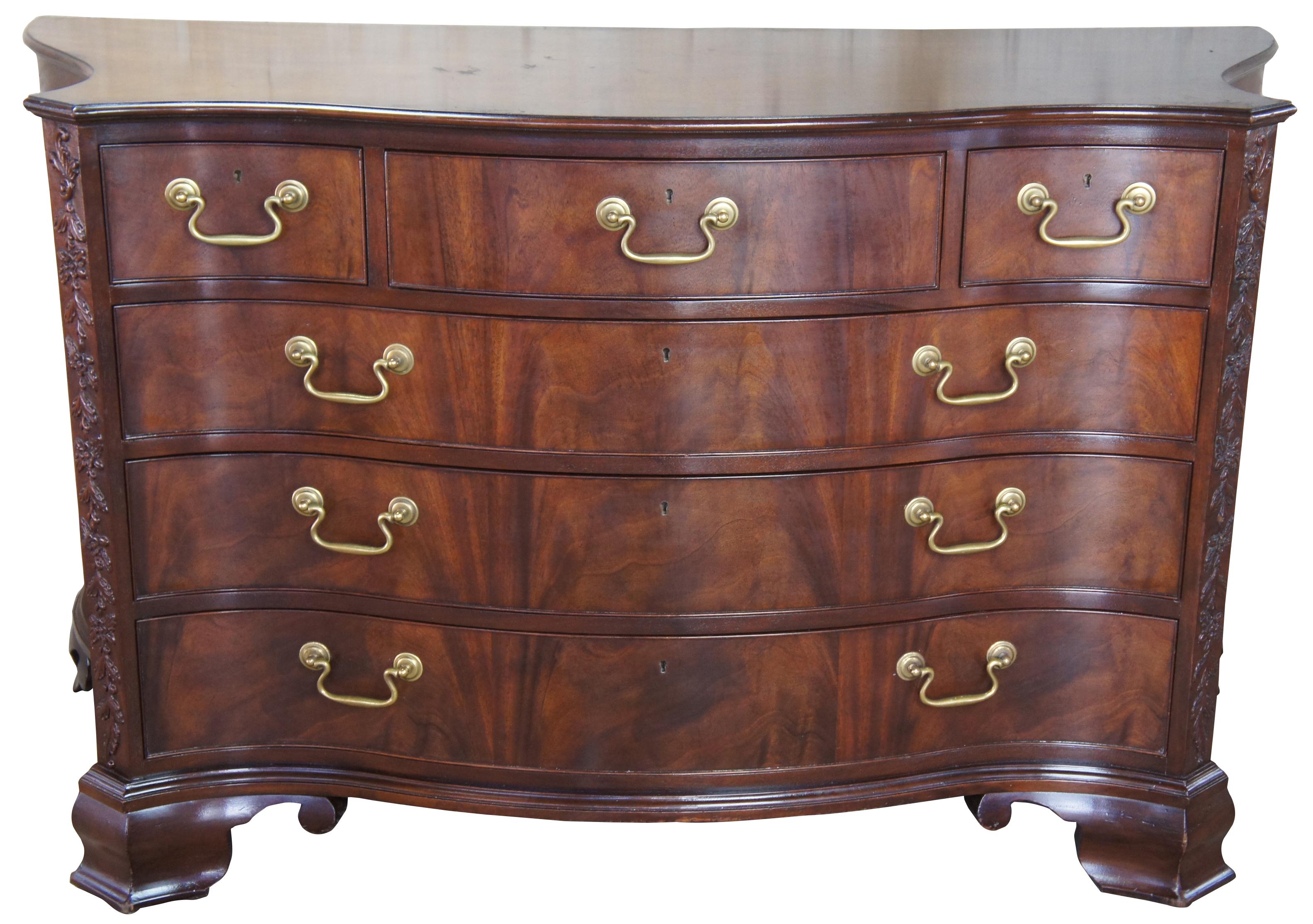 Baker Stately Homes Chippendale serpentine mahogany bachelor’s chest dresser

Baker Stately Homes serpentine chest. A fine Chippendale serpentine carved mahogany chest, with moulded border to the shaped top, fitted with three short drawers and