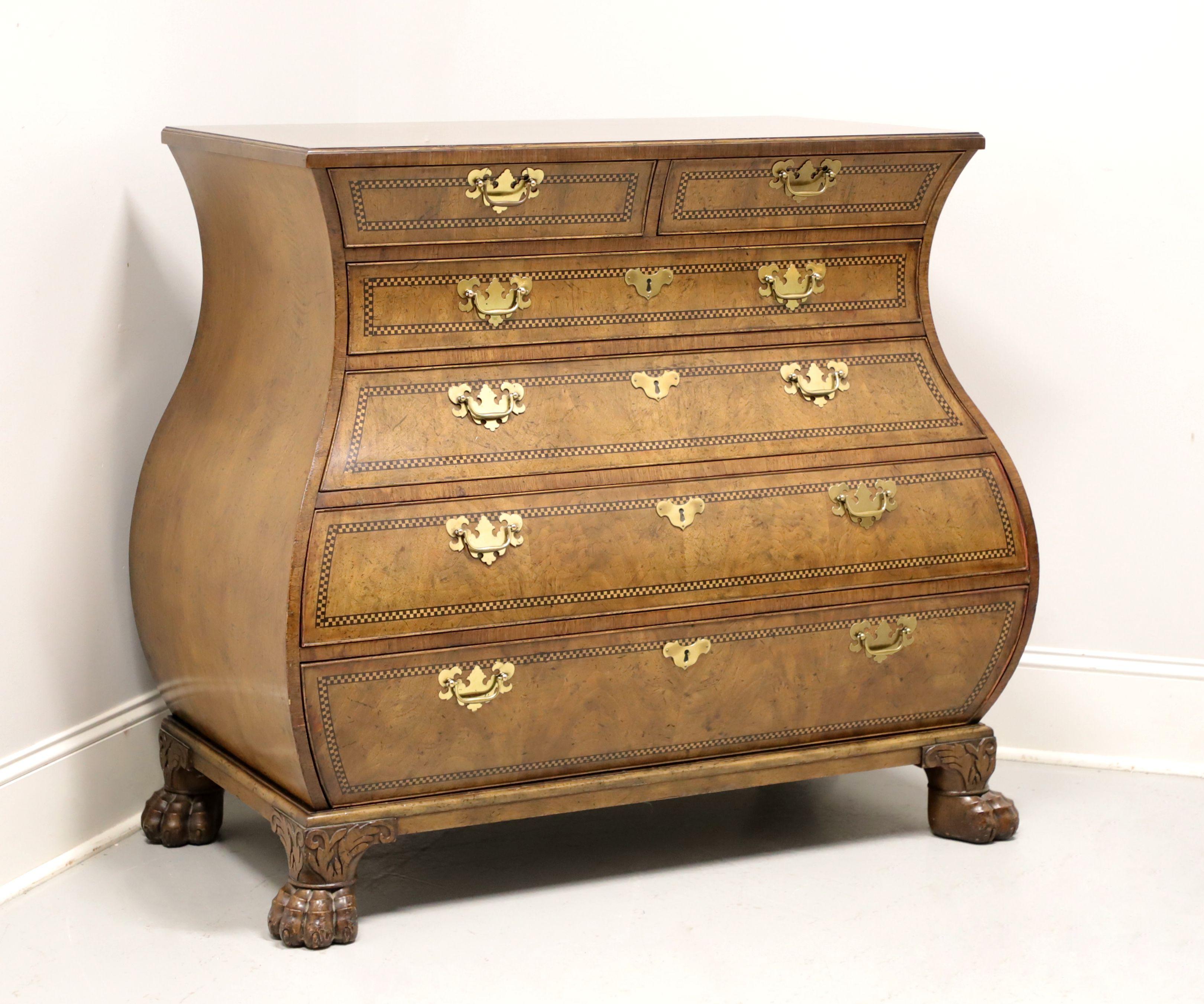 A George II style bombe commode chest by Baker Furniture, from their Stately Homes Collection. Walnut with slightly distressed finish, inlays, moulded rectangular top inlaid with cross-banded borders & chequer pattern bands, graduated bombe shape,