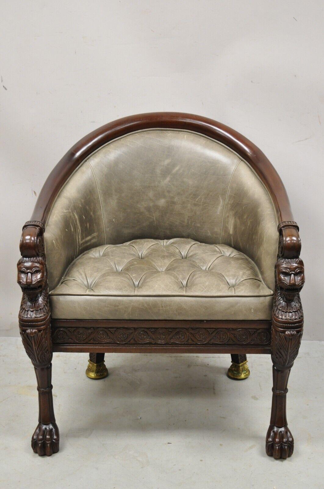 Baker Stately Homes Grey Leather Lions Head Pull Up Tub Chair Club Chair. Item features a grey button tufted leather upholstery, carved paw feet, carved lions to frame, beautiful wooden barrel back, cast brass/bronze feet, original labels, quality