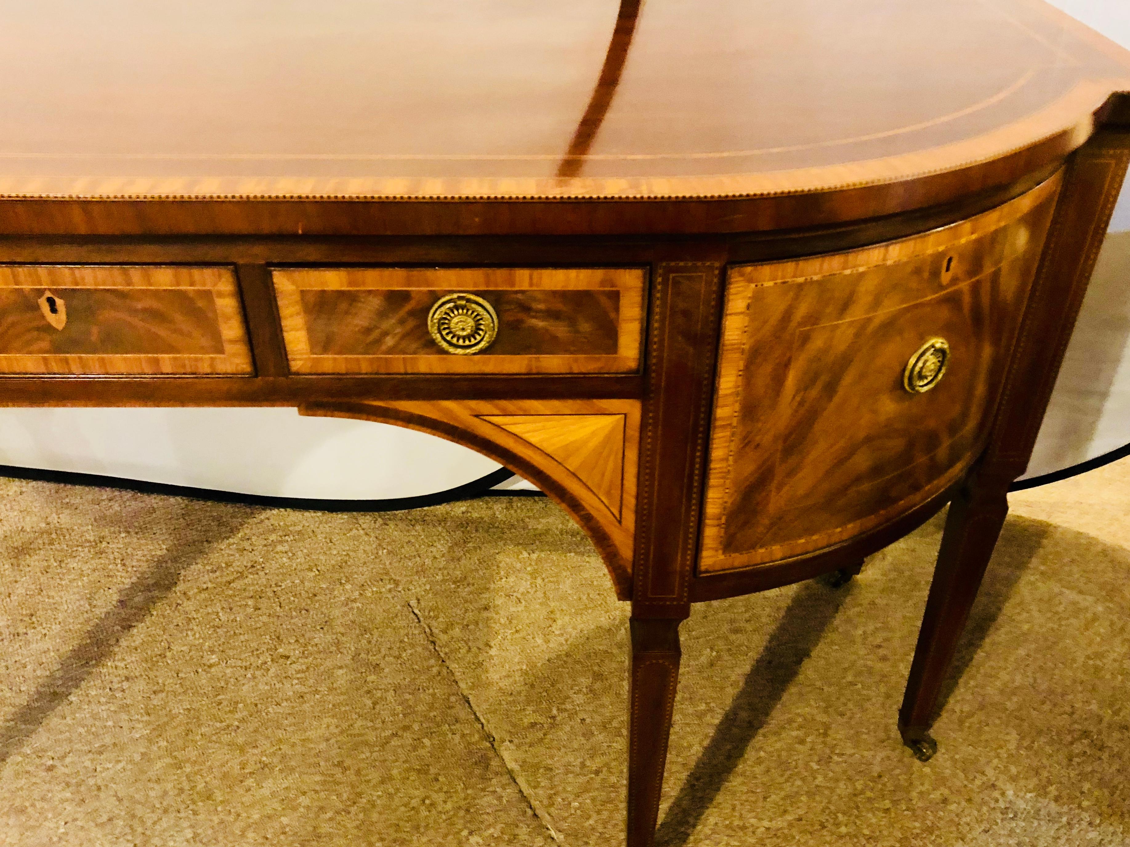 Baker Stately Homes Sheraton Style Mahogany and Satinwood Inlaid Sideboard In Good Condition In Stamford, CT