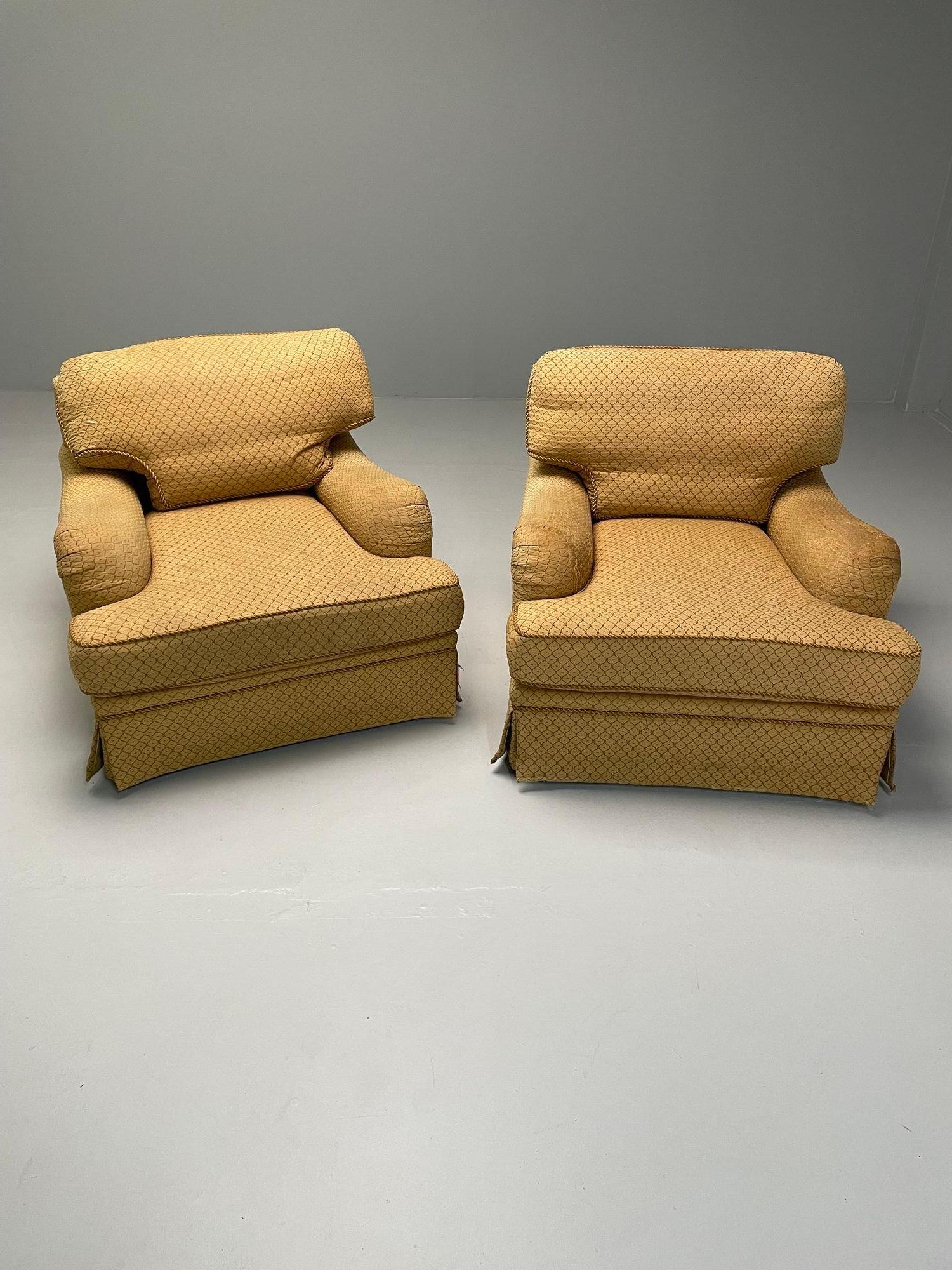 Baker, Traditional Style, Large Swivel Chairs, Beige Fabric, Re-Upholstery

Pair of very large Baker (labeled) traditional lounge chairs with scroll arms and wooden swivel bases. One chair has a worn/frayed set of arms. Price is reflective of the