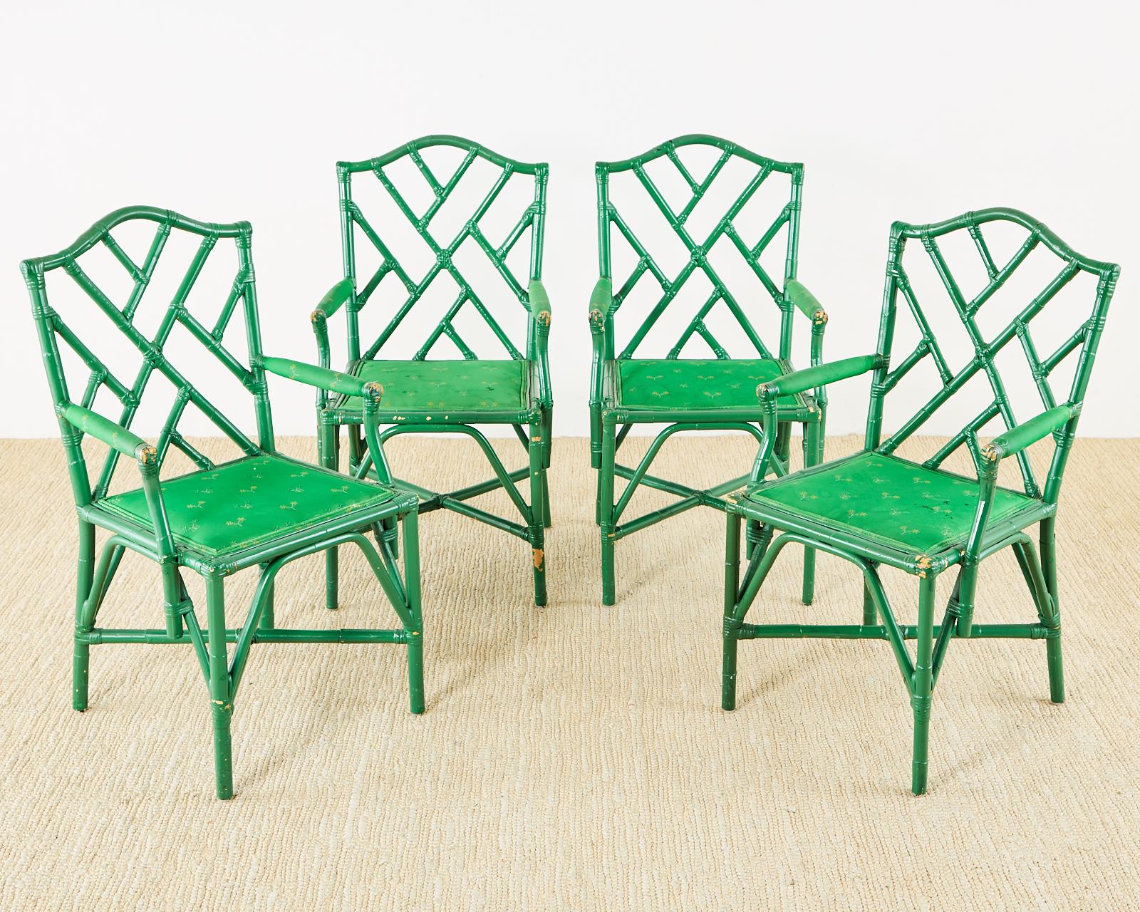 Maximalist Trompe l'oeil card or poker games table with four matching rattan armchairs. The table features a needlepoint top depicting cards and gambling related items. The table has a lucky green lacquer finish with Asian red spandrels and is made