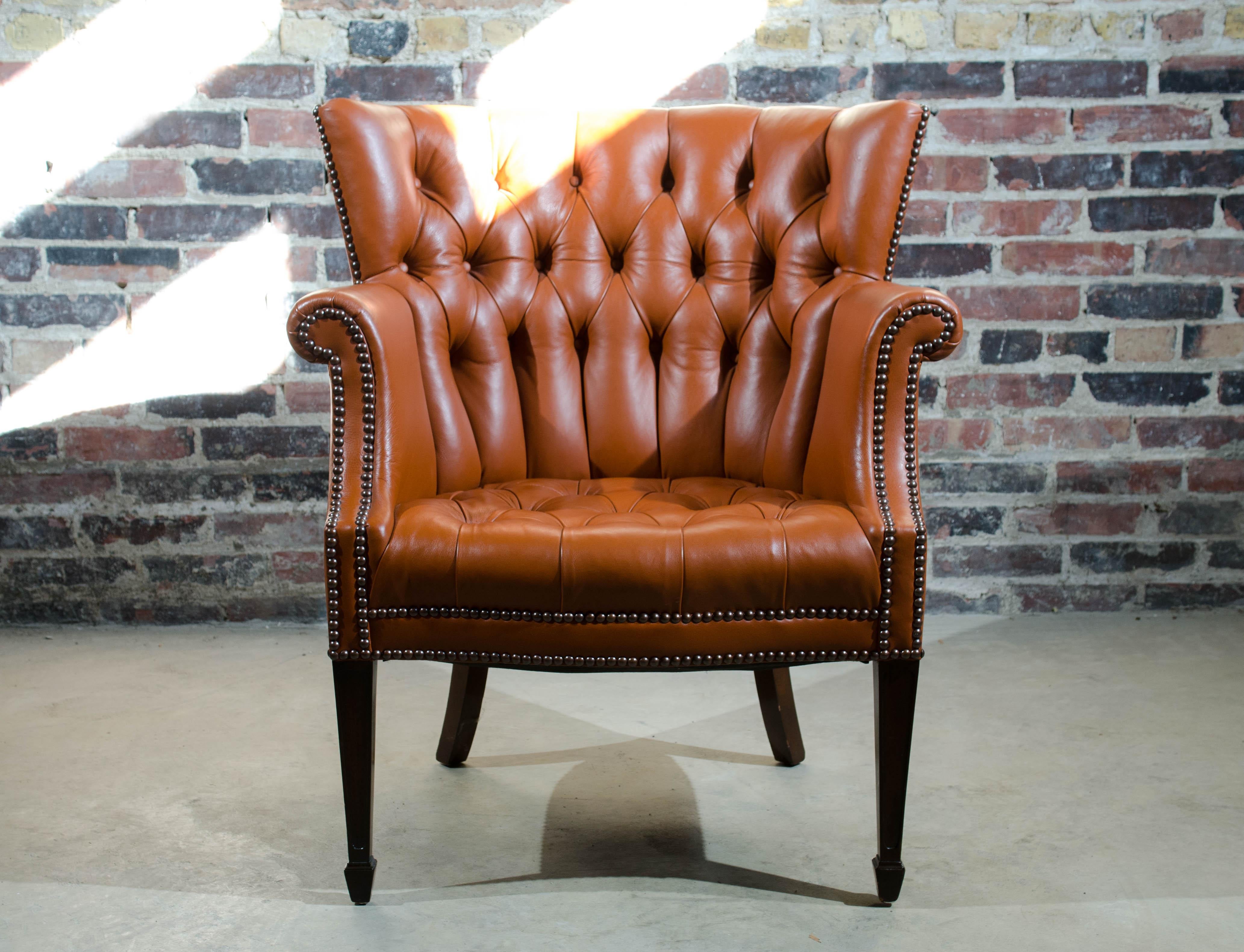 American Baker Wing Back Chair in Holly Hunt Spice Colored Leather with Nailhead Trim For Sale