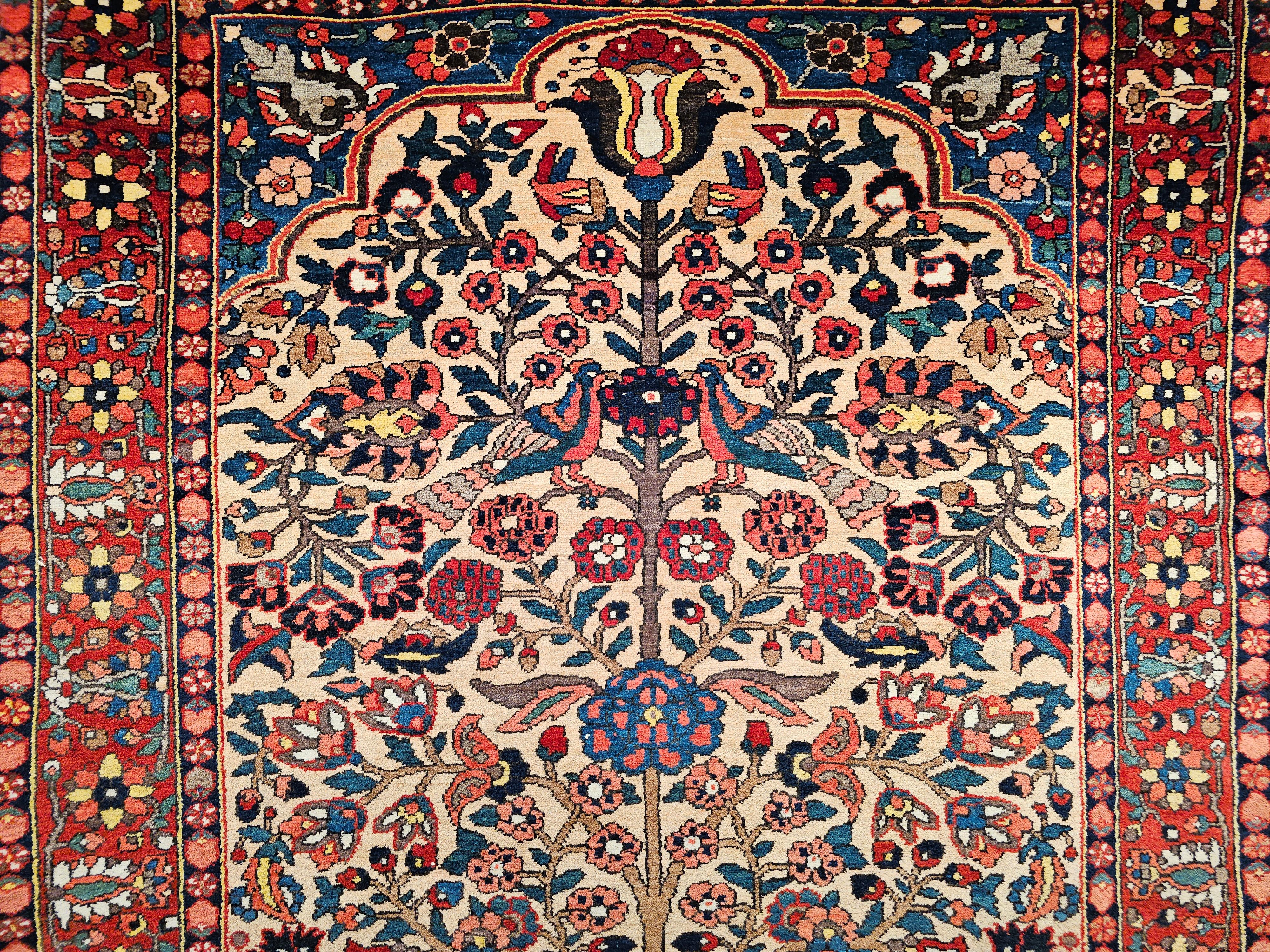 A 19th century hand-woven Persian Bakhtiari Bibibaft in vase pattern in a pale yellow with red border and French blue corners,.  A truly magnificent masterpiece in design and fine weaving from the Bakhtiari tribes of western Persia from the 4th