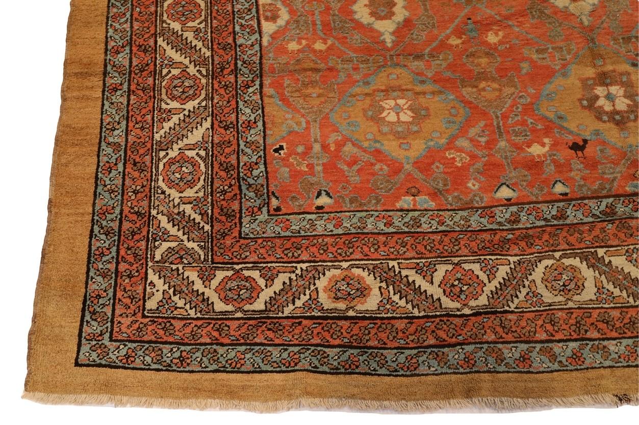 Behold, an exquisite masterpiece that transcends time and captivates the senses—a magnificent Bakshaish room-size rug, a treasure of unparalleled beauty and opulence. Nestled within its sumptuous fibers lies a world of artistry, skillfully woven