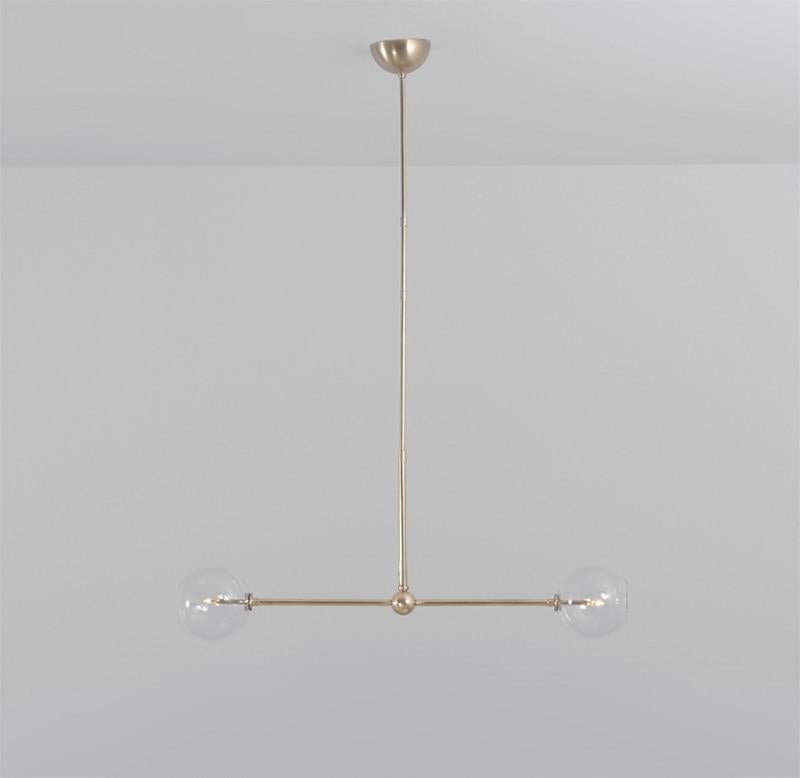Brass 150 x 150 Contemporary chandelier by Schwung
Dimensions: D 15 x W 90.4 x H 163.3 cm 
Materials: Solid brass, hand-blown glass globes
Finish: Natural Brass. 
Available in finishes: Black Gunmetal or Polished Nickel. Also available in