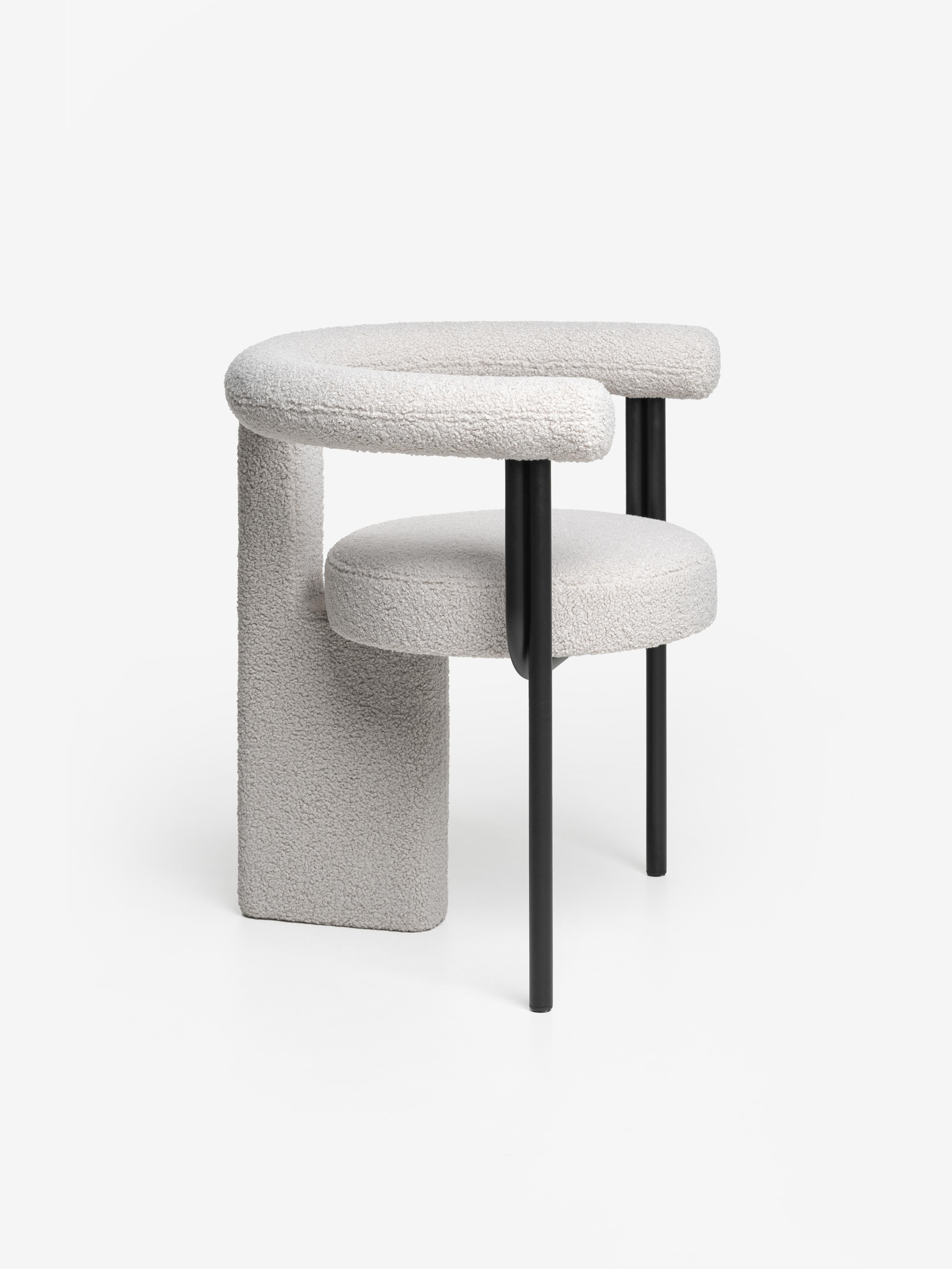 Dining chair Balance invites us to relax and try to find so much needed balance in our life. 
Design of this chair is inspired by the art of “rock balancing”, where natural stones are stacked on top of each other in pillars of varying heights, as if