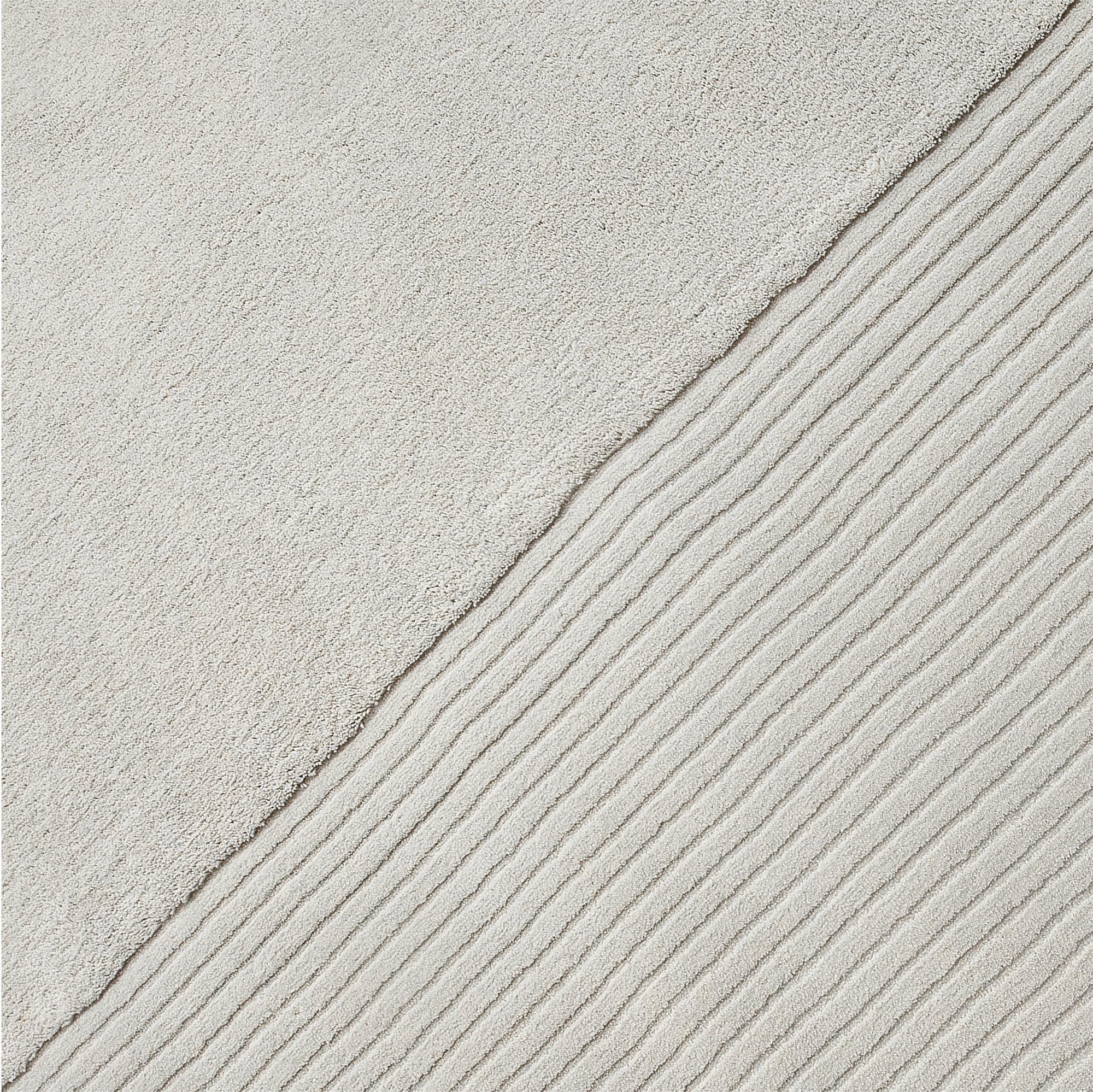 Teppich aus der Kollektion Geometrie der Begegnungen, die anschaulich zeigt, wie Begegnungen unser Leben verändern. Teppich mit unterschiedlichen Höhen und handgefertigt aus 100% recycelbaren Materialien