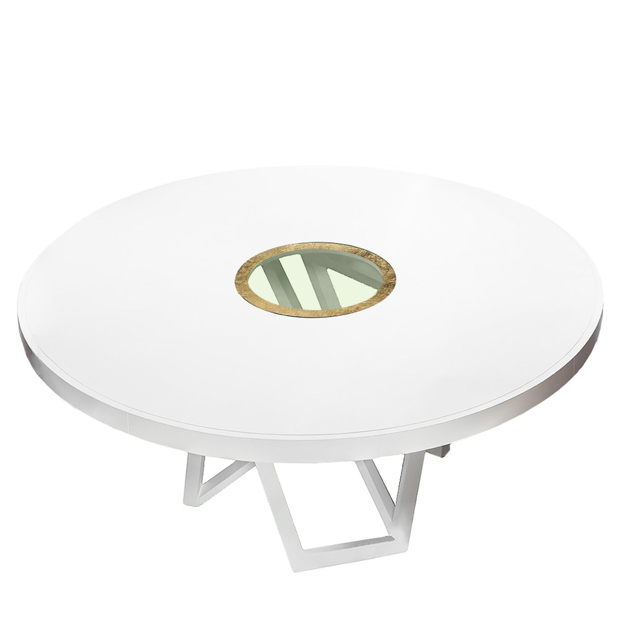 The Balboa dining table is a sleek and substantial gathering piece. A clear, tempered glass centrepiece with a hand gilded metallic border gives a stunning visual effect into the carefully designed intertwined base. Comfortably accommodates six