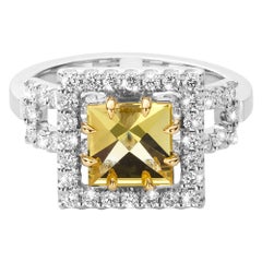 Balcony: 18kt white gold cocktail ring with a yellow beryl.