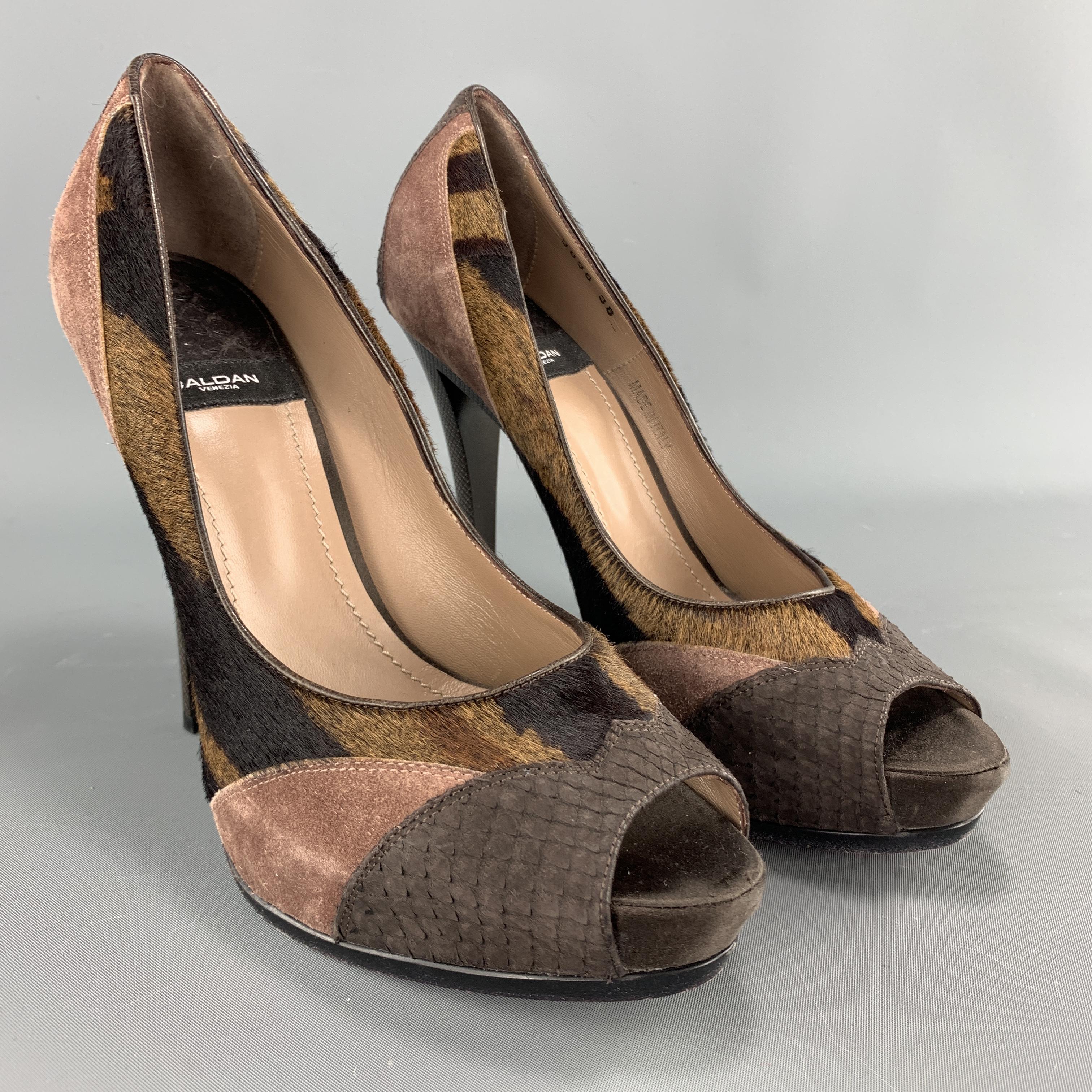 BALDAN pumps come in mauve purple suede with gray snake skin leather and brown tiger print ponyhair panels, peep toe, and hidden platform. Made in Italy.

Very Good Pre-Owned Condition.
Marked: IT 38

Heel: 5in.
Platform: 1 in.