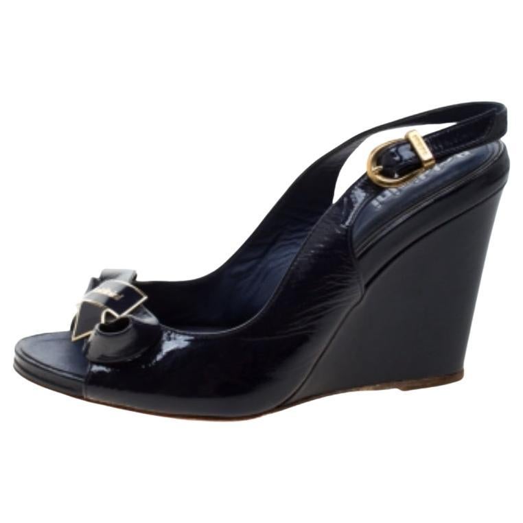 Baldinini Blaue Sandalen mit Keilriemen und Knöchelriemen aus Lederschleife Größe 37 im Angebot