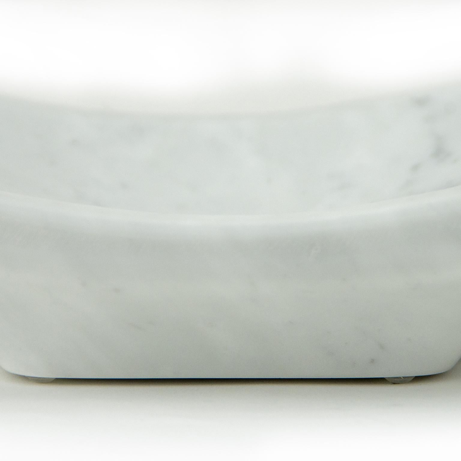 A unique marble bowl that is perfect for a centerpiece or for placing on its own in any interior space. Made of white Carrara marble. Made in Italy.
 