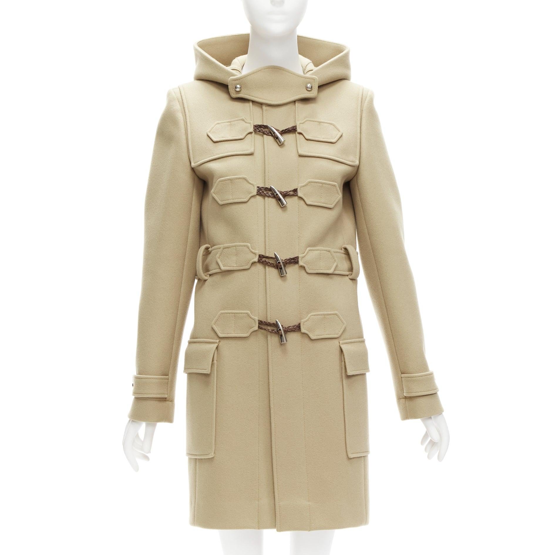BALENCIAGA 2005 Ghesquiere beige wool blend toggle hooded coat FR38 M
Reference: TGAS/D00910
Brand: Balenciaga
Designer: Nicolas Ghesquiere
Collection: 2005
Material: Wool, Virgin Wool, Nylon
Color: Beige, Silver
Pattern: Solid
Closure: Button
Extra