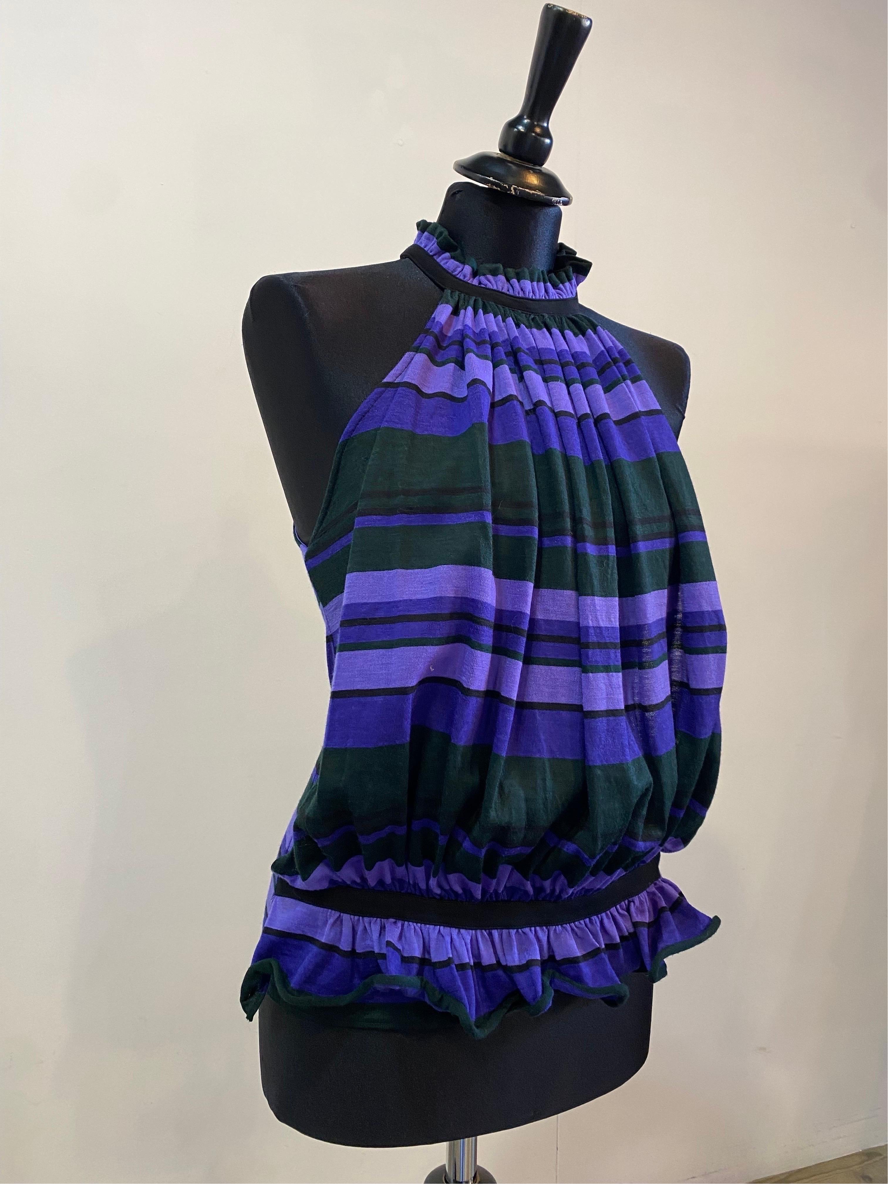 Balenciaga Top.
Striped pattern in shades of purple.
Primary fabric: wool.
Back zip closure.
French size 36 which corresponds to an Italian 40.
Bust 38 cm
Length 66 cm
Good general condition, shows signs of normal use.