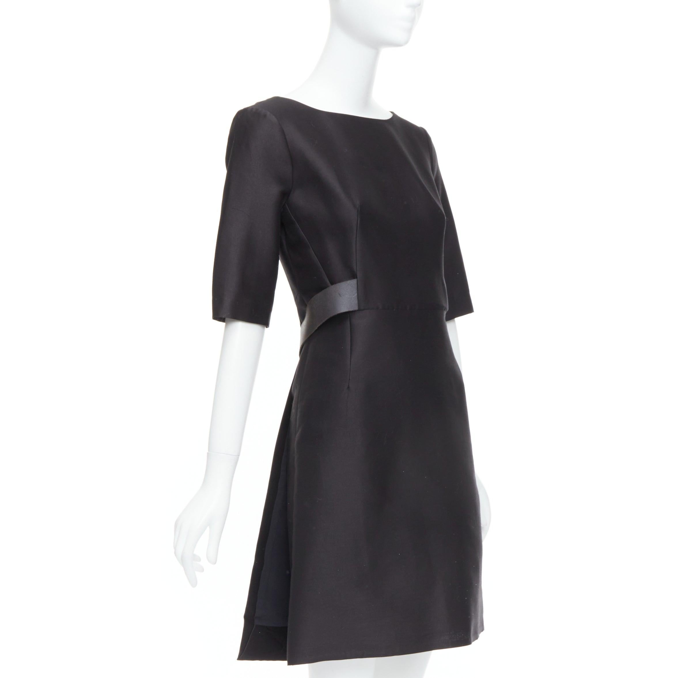 BALENCIAGA 2008  Ghesquiere Black Dress cotton silk crepe A-line belted FR36 S
Reference: MECG/A00045
Brand: Balenciaga
Designer: Nicolas Ghesquiere
Model: Black Dress
Collection: 2008
Material: Cotton, Silk
Color: Black
Pattern: Solid
Closure: