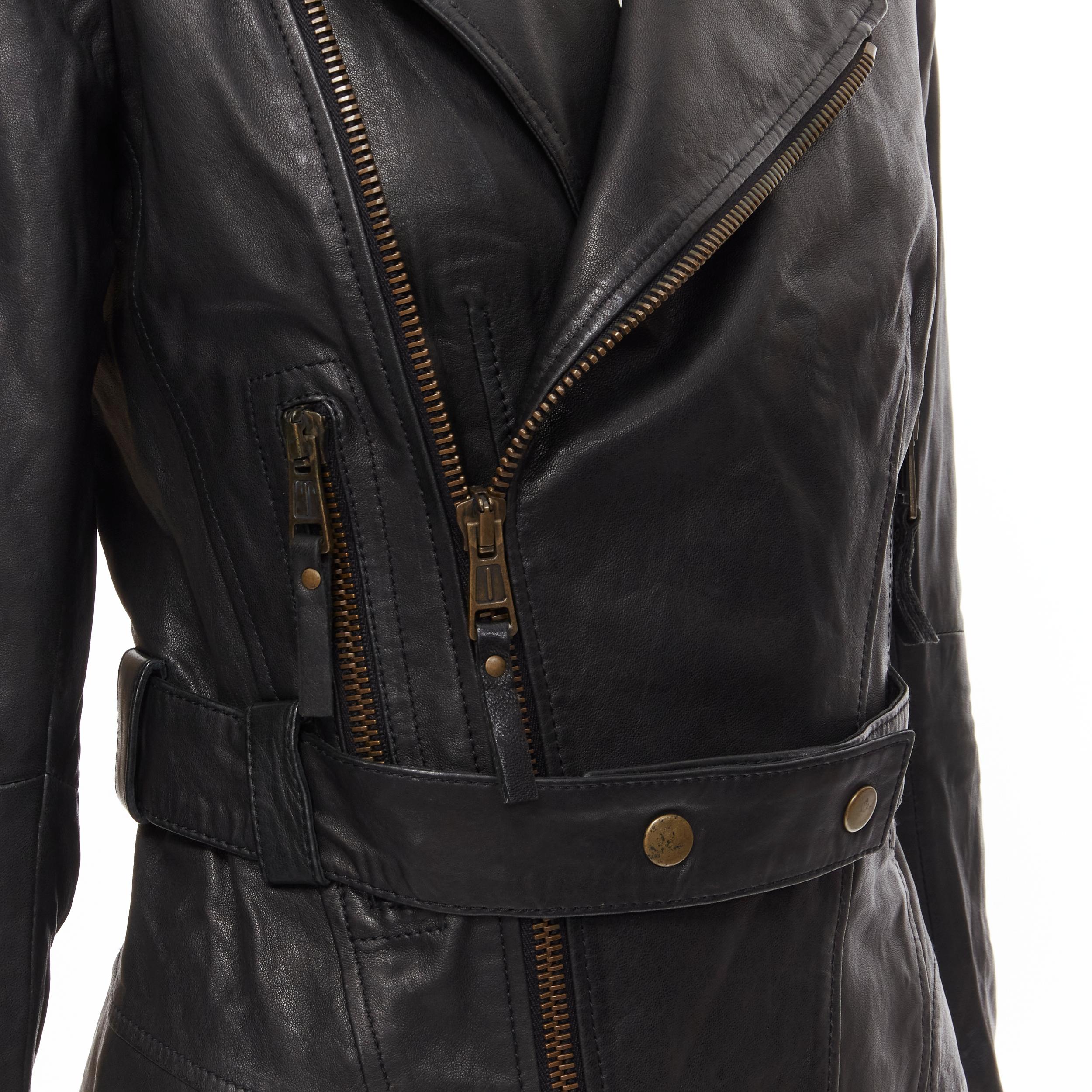 BALENCIAGA 2009 black lambskin leather asymmetric collar belted biker jacket FR36 XS 
Reference: MELK/A00011 
Brand: Balenciaga 
Designer: Nicolas Ghesquiere 
Collection: 2009 
Material: Leather 
Color: Black 
Pattern: Solid 
Closure: Zip 
Extra