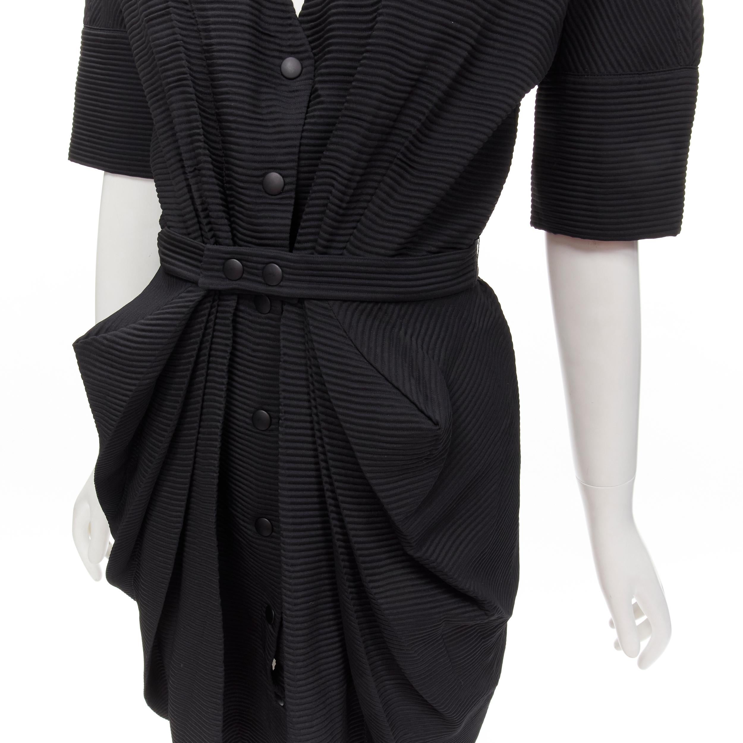 BALENCIAGA 2009 plunge neckline button front gathered pleat short dress FR36 S
Brand: Balenciaga
Designer: Nicolas Ghesquiere
Collection: 2009 
Material: Polyester
Color: Black
Pattern: Solid
Closure: Snap Buttons
Extra Detail: Pleated ribbed